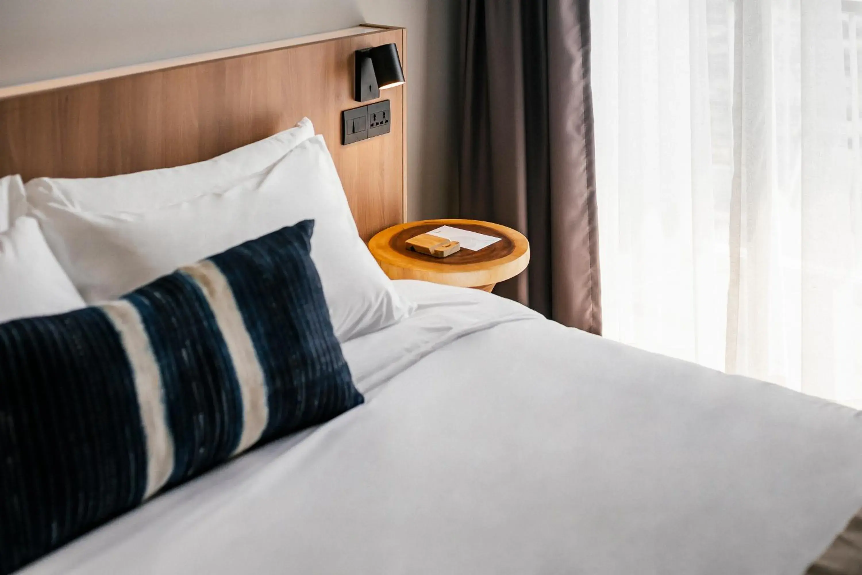 Bed in HOMM Boutique Hotel Bed in HOMM Boutique Hotel