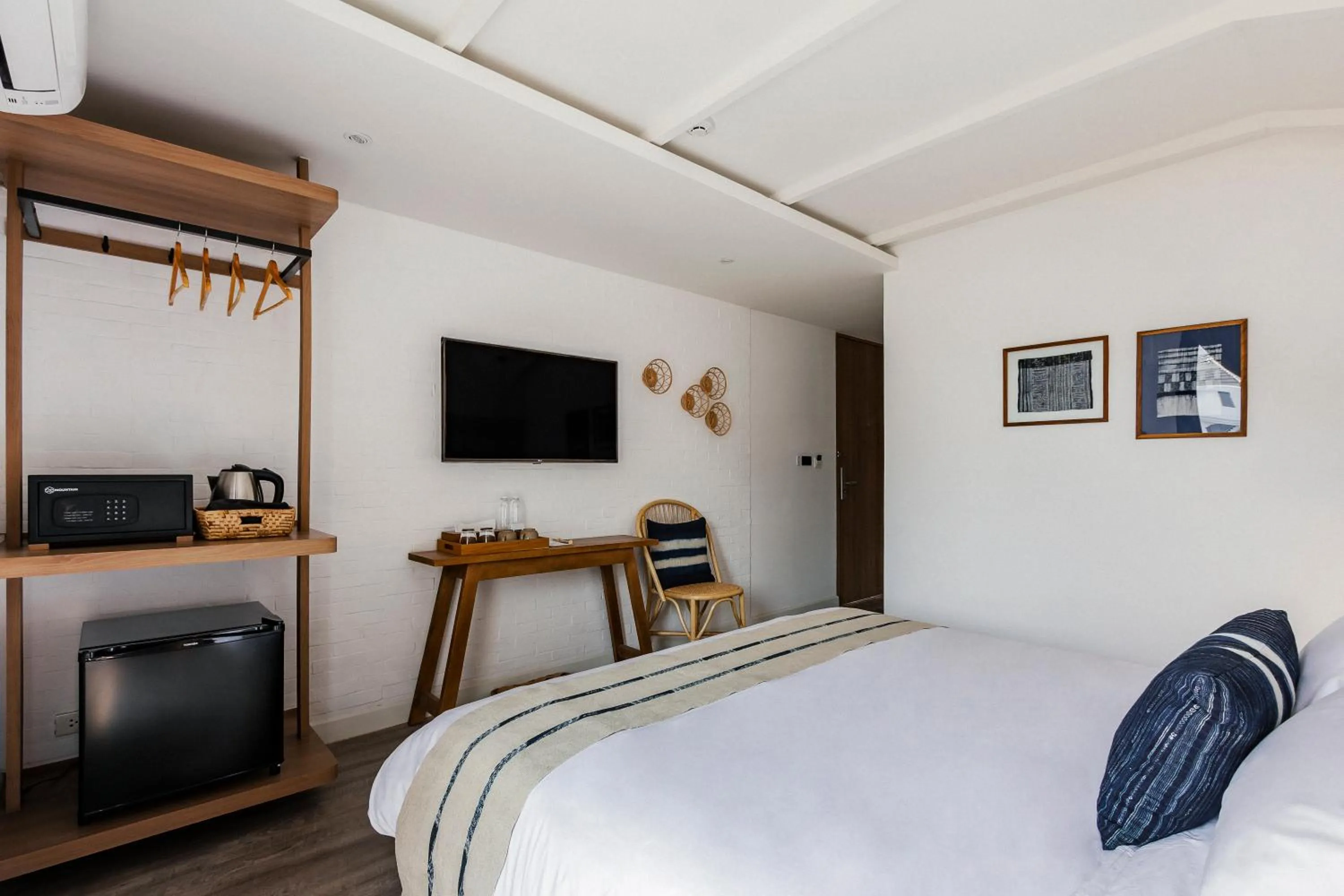 Bed in HOMM Boutique Hotel