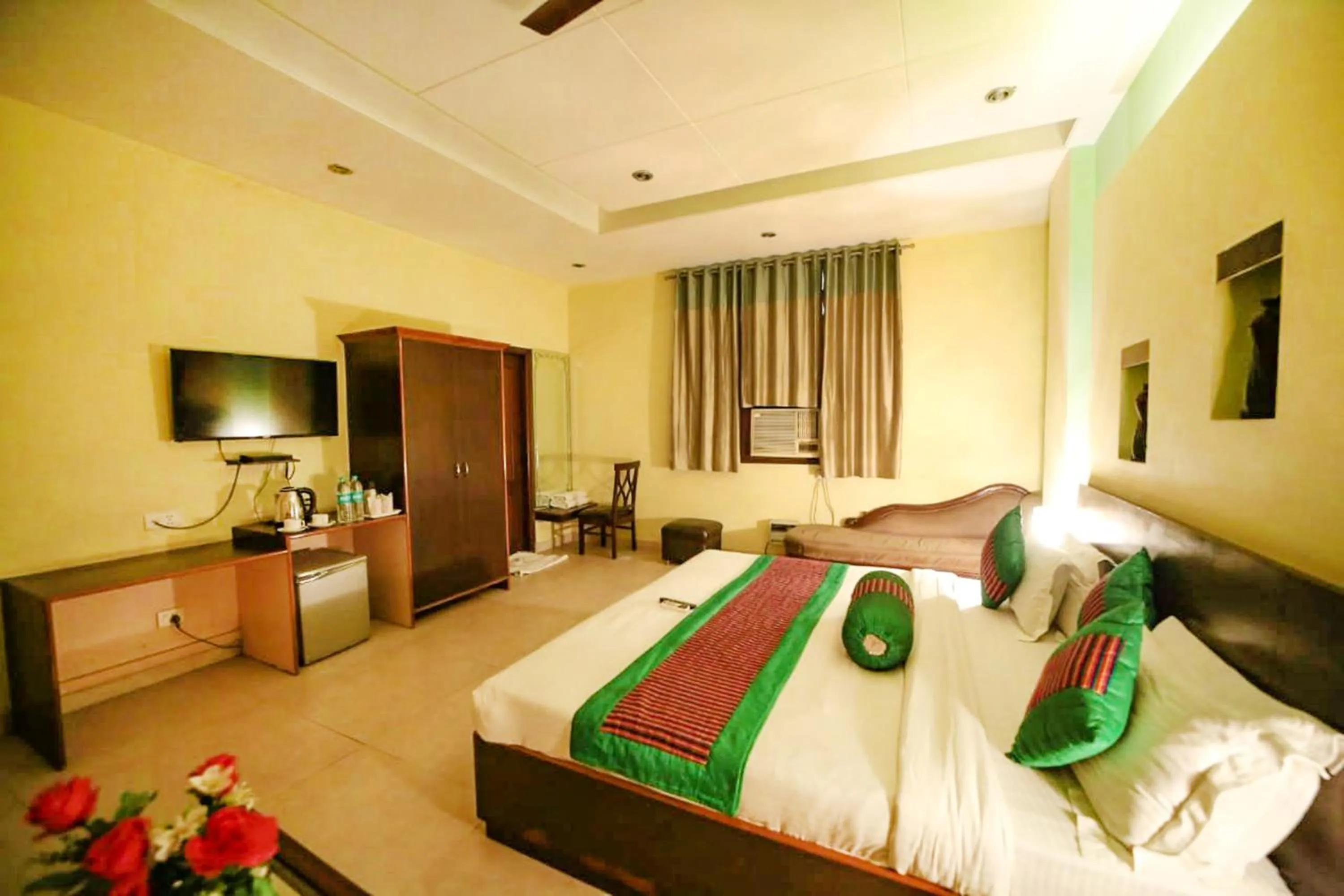 Bedroom in FabHotel Arihant Inn