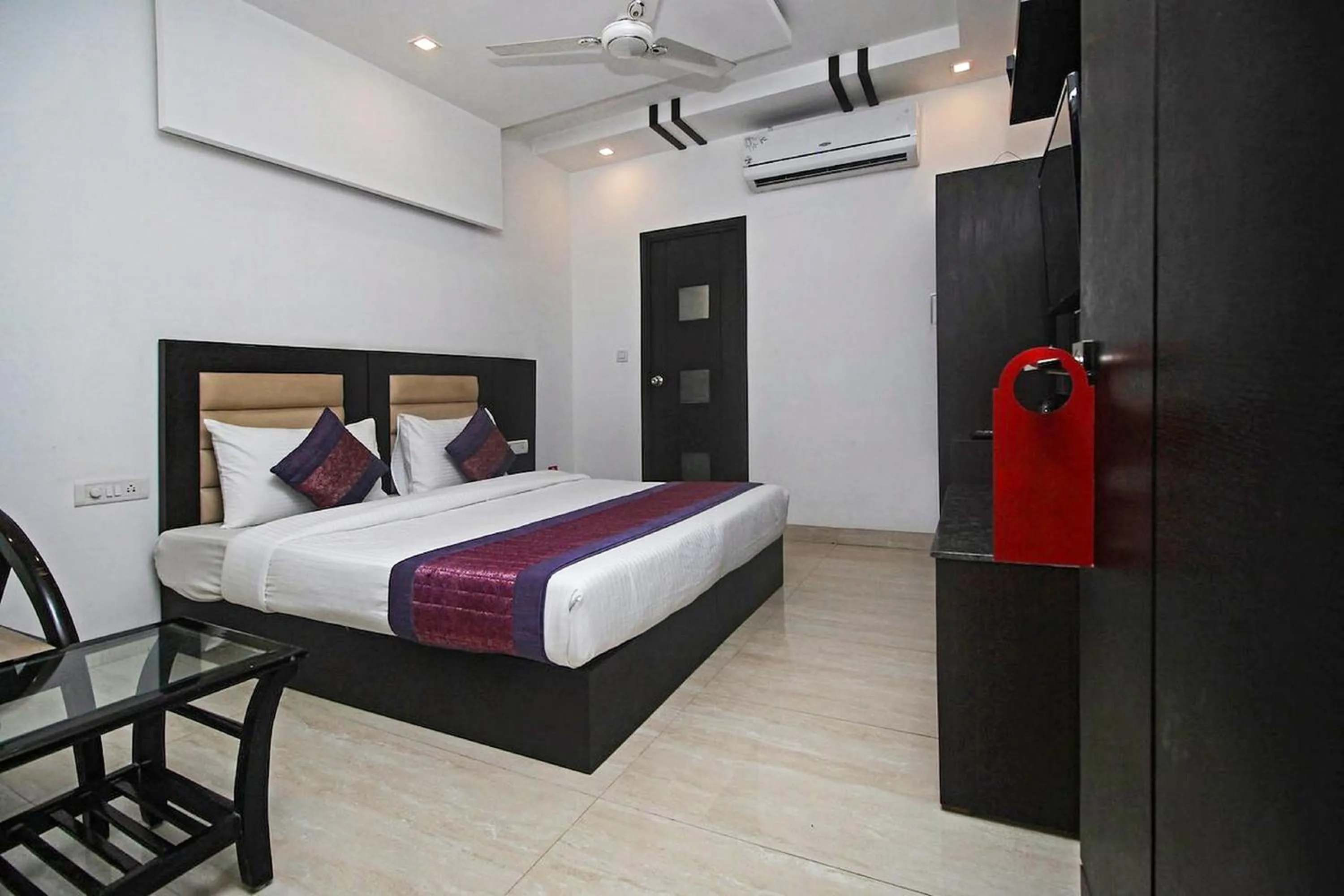 Bedroom in FabHotel Arihant Inn