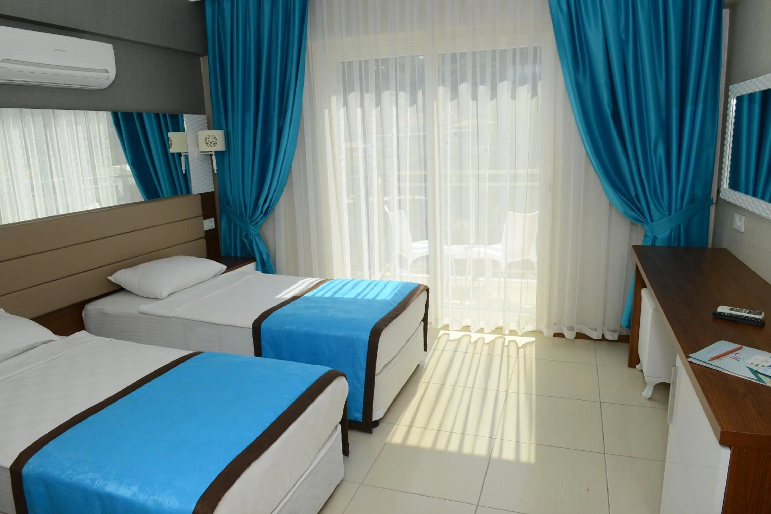 Photo of the whole room, Bed in Marcan Resort Hotel