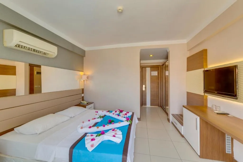 Bed in Marcan Resort Hotel