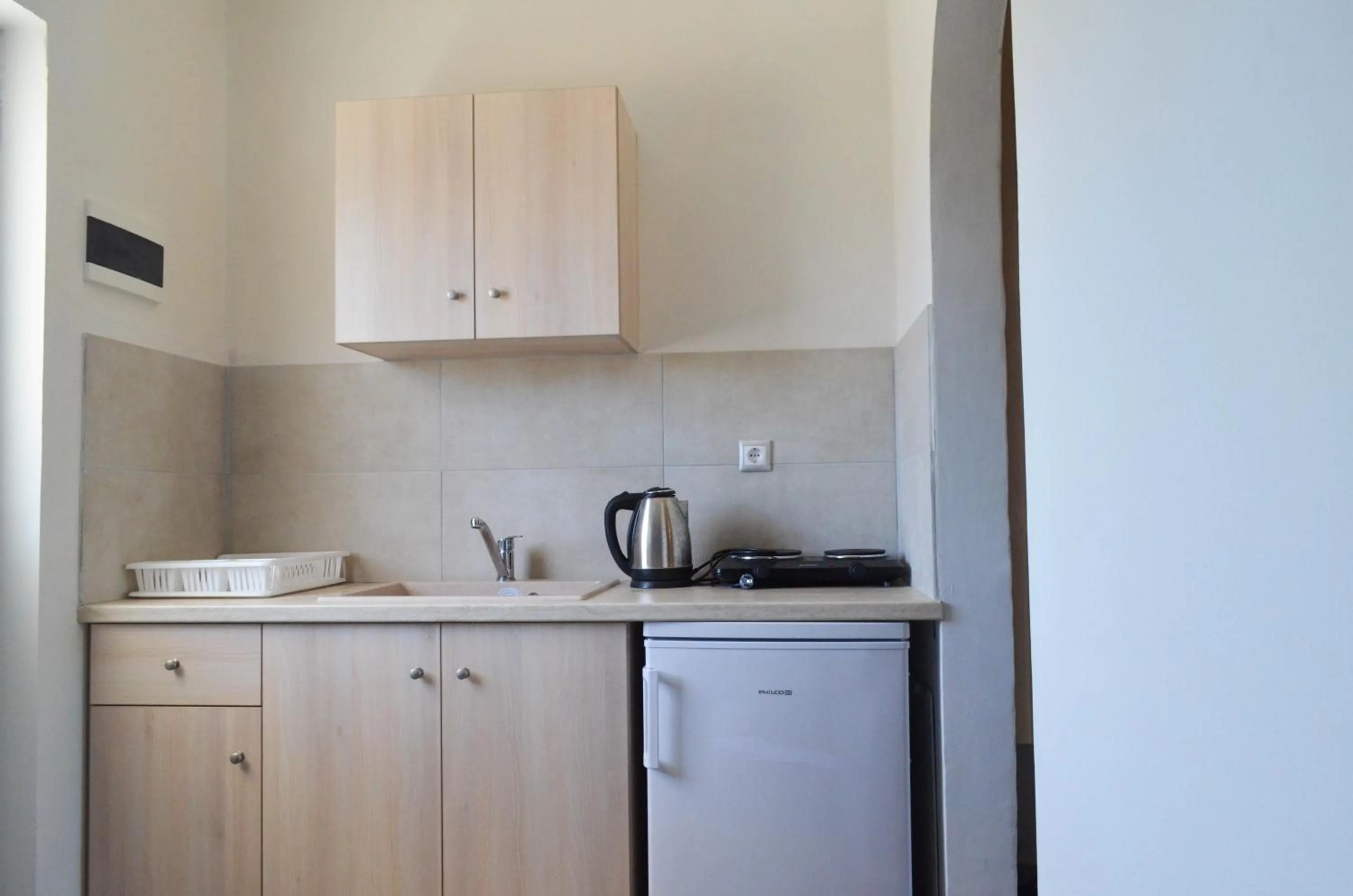Kitchen or kitchenette in Sevi Apartments