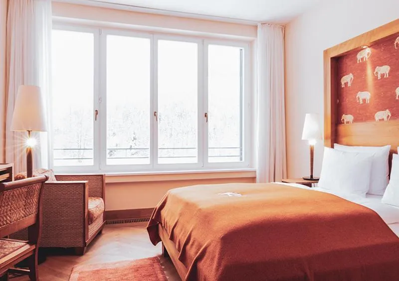 Bed in Schloss Elmau Luxury Spa Retreat & Cultural Hideaway