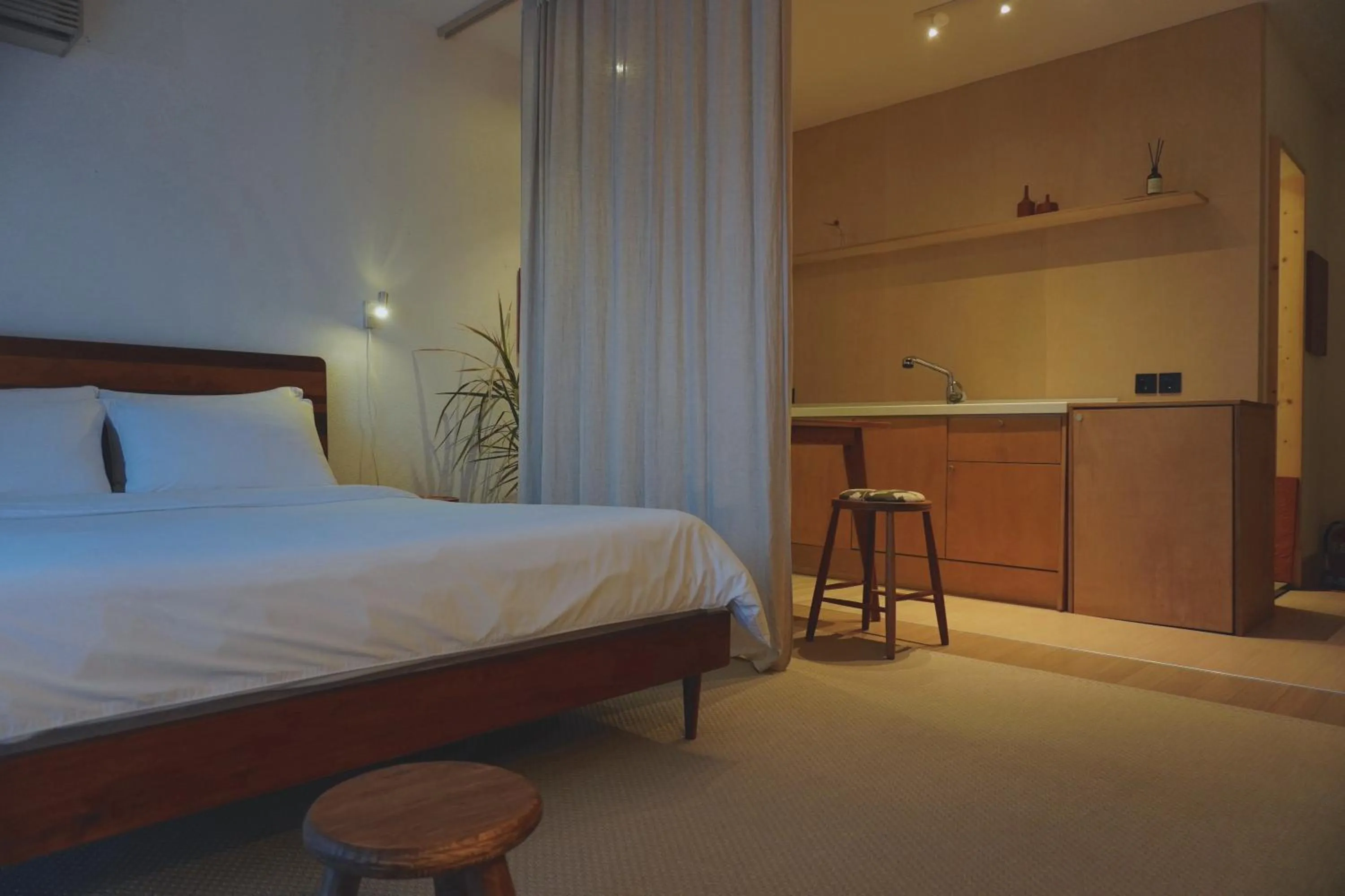 Bed in At corner resort & garden