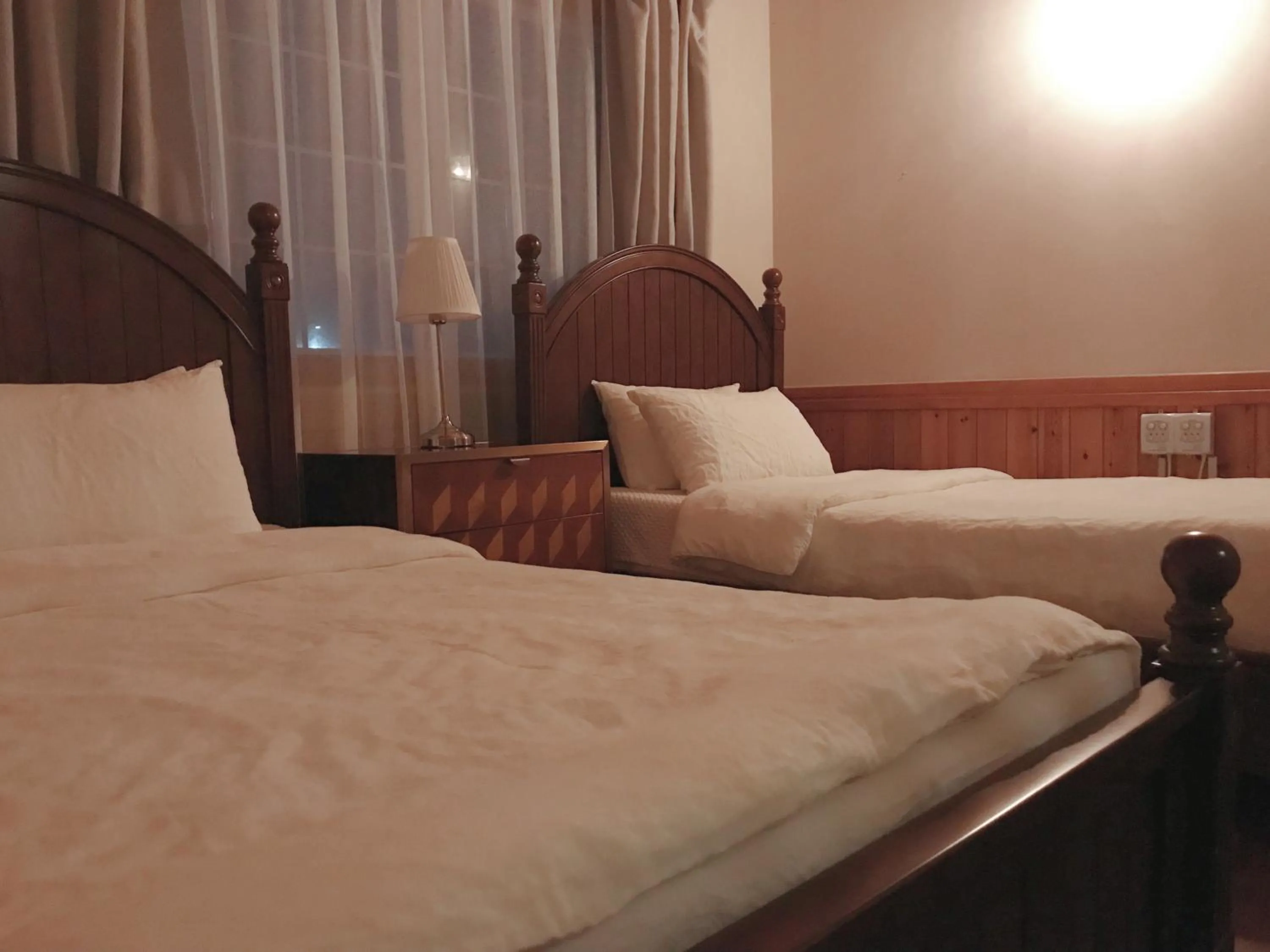 Bed in At corner resort & garden