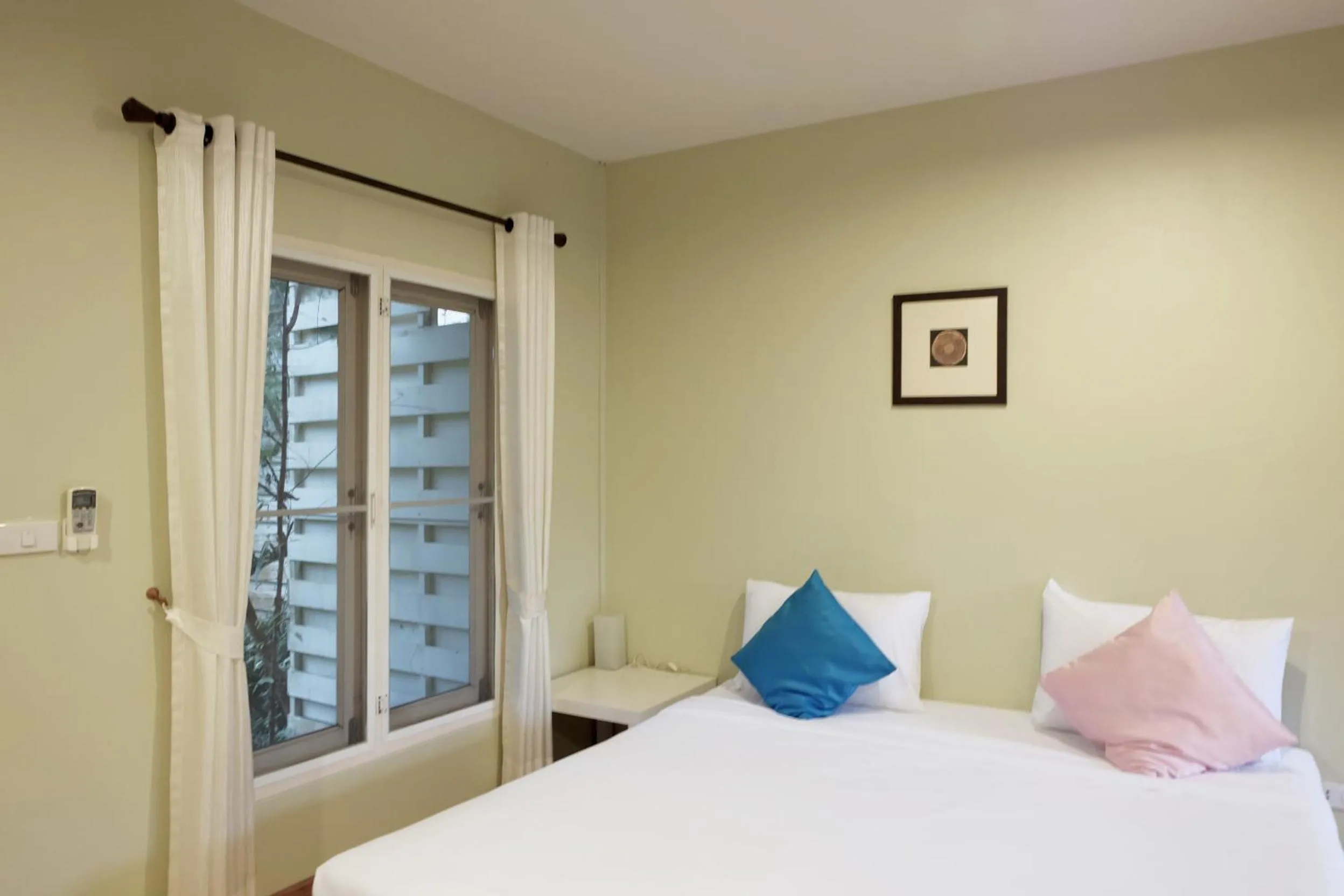 Bed in Khao Yai Cottage