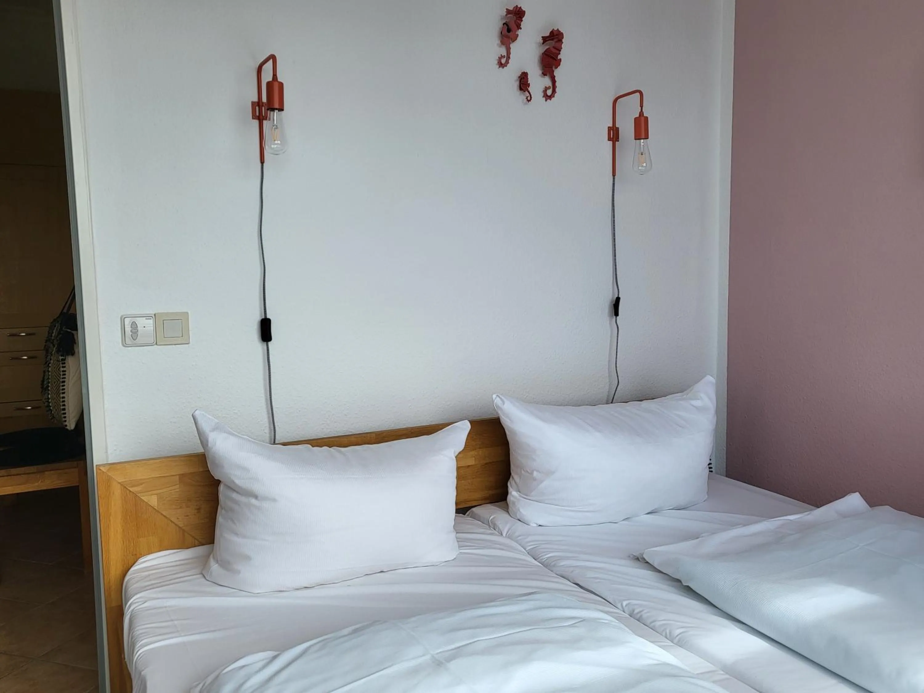 Bed in Penthousewohnung 66 im Haus Villa Anna