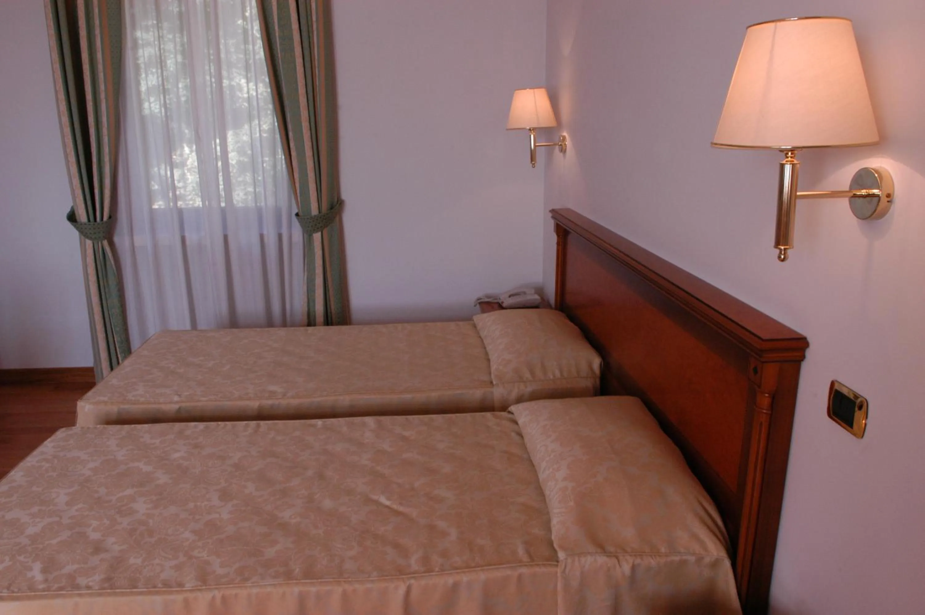 Bed in Pilgrim's Hotel