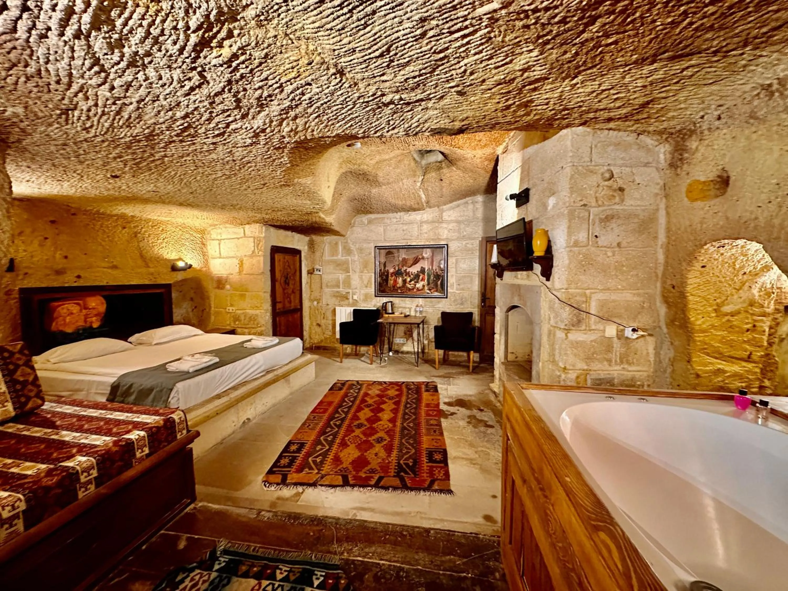 Bed in Harkasos Cave Hotel