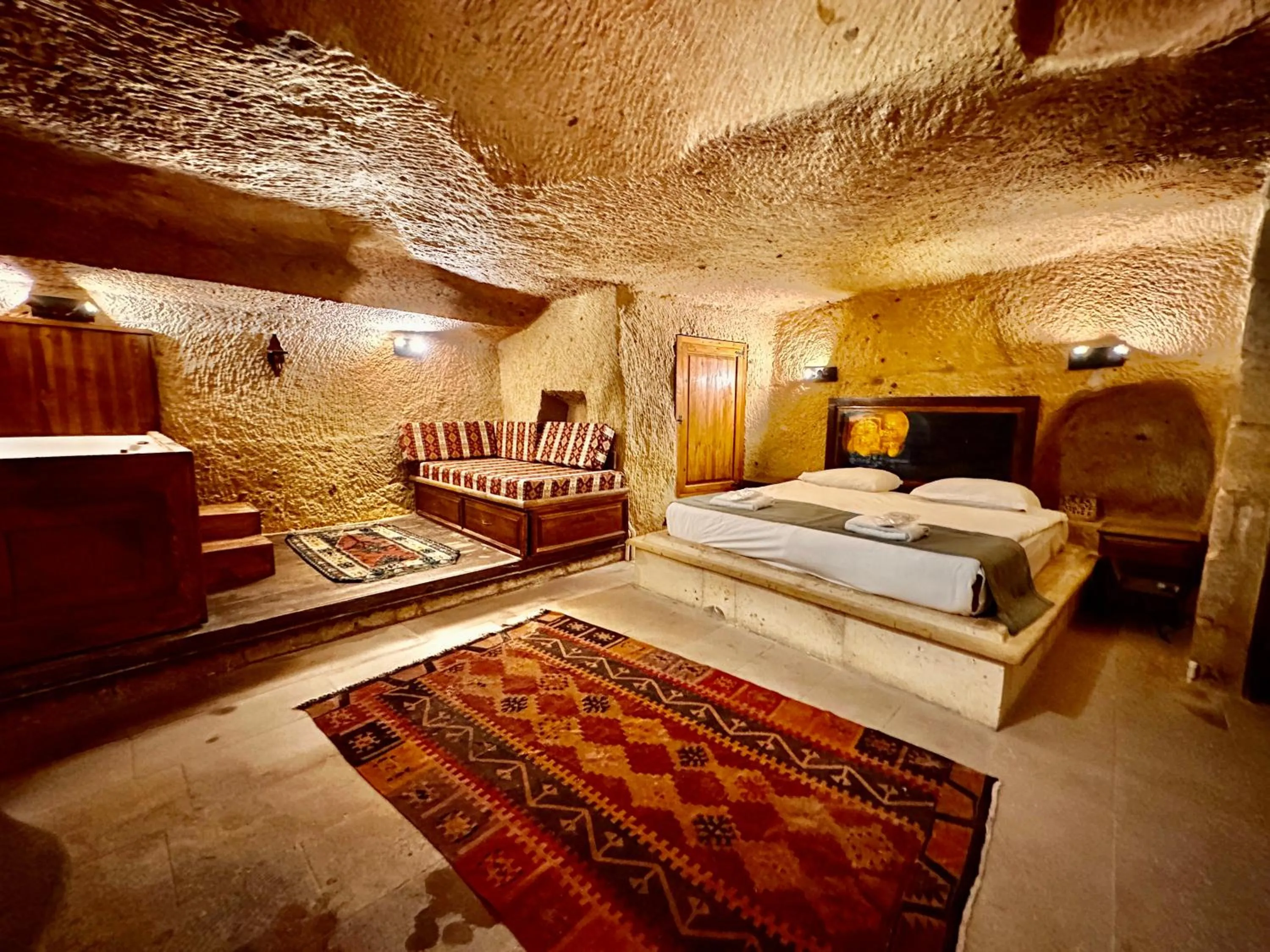 Bed in Harkasos Cave Hotel