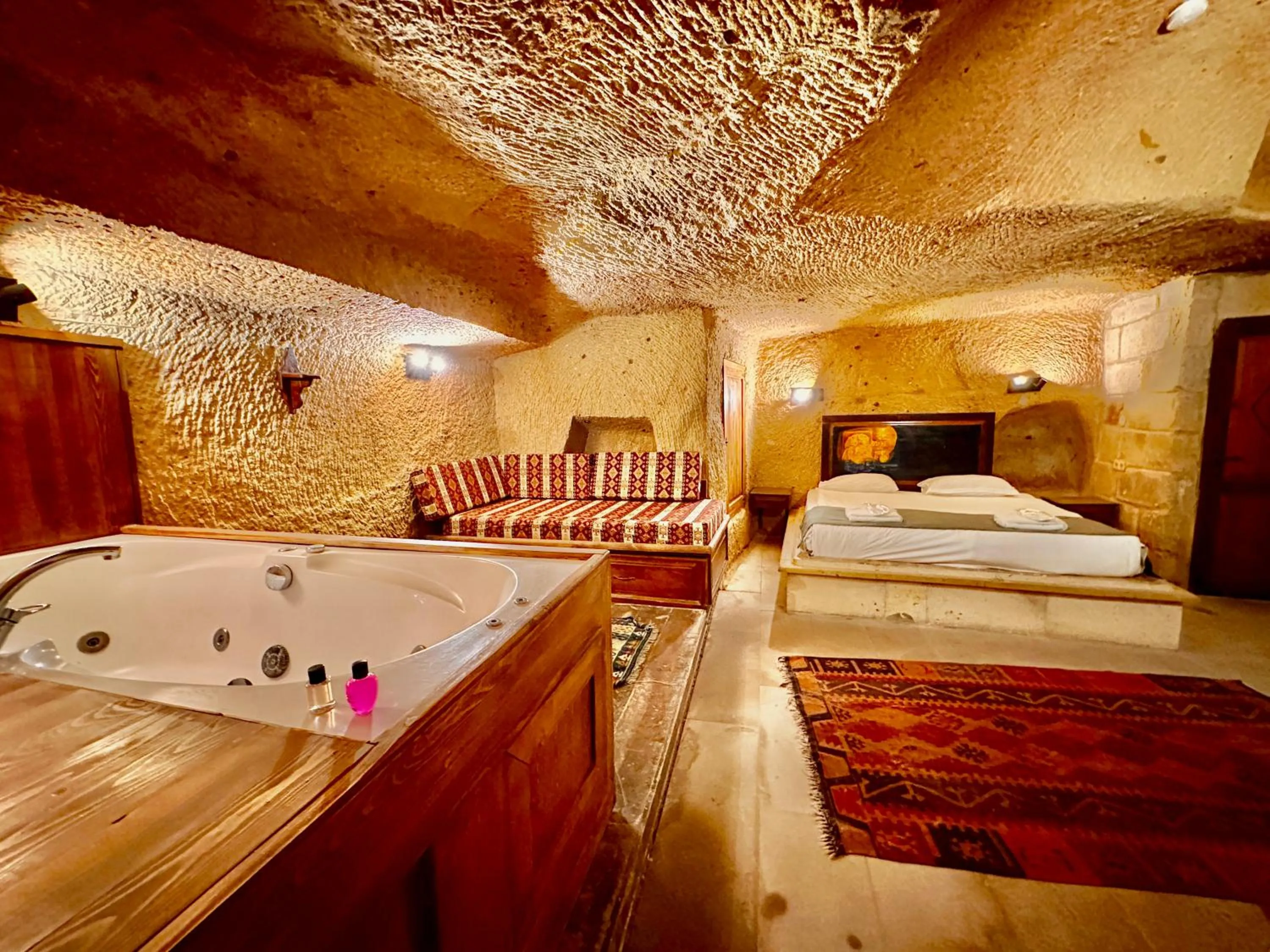 Bed in Harkasos Cave Hotel