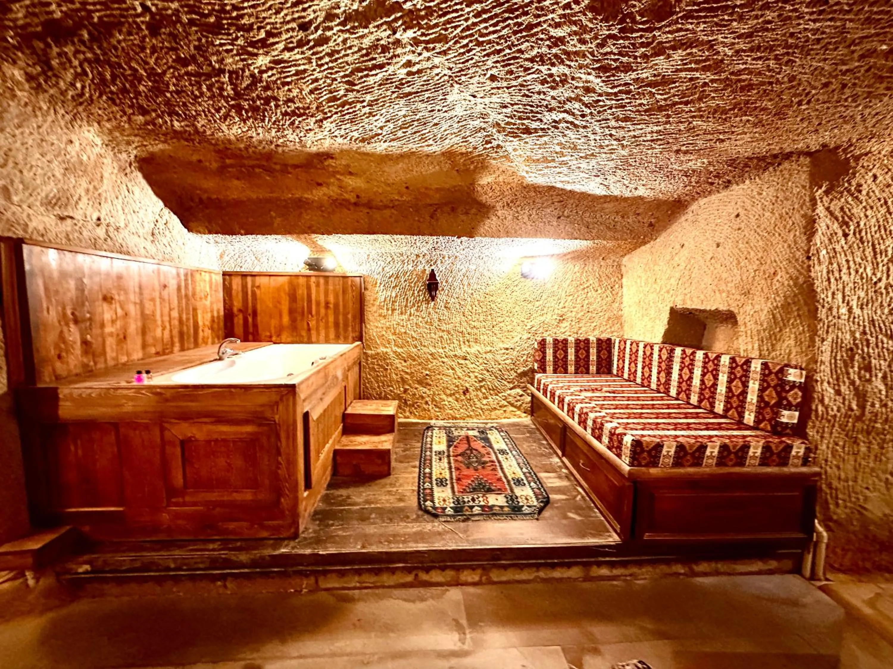 Bed in Harkasos Cave Hotel