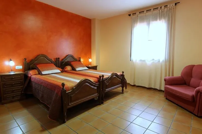 Bed in Hotel Rural Hojaranzos