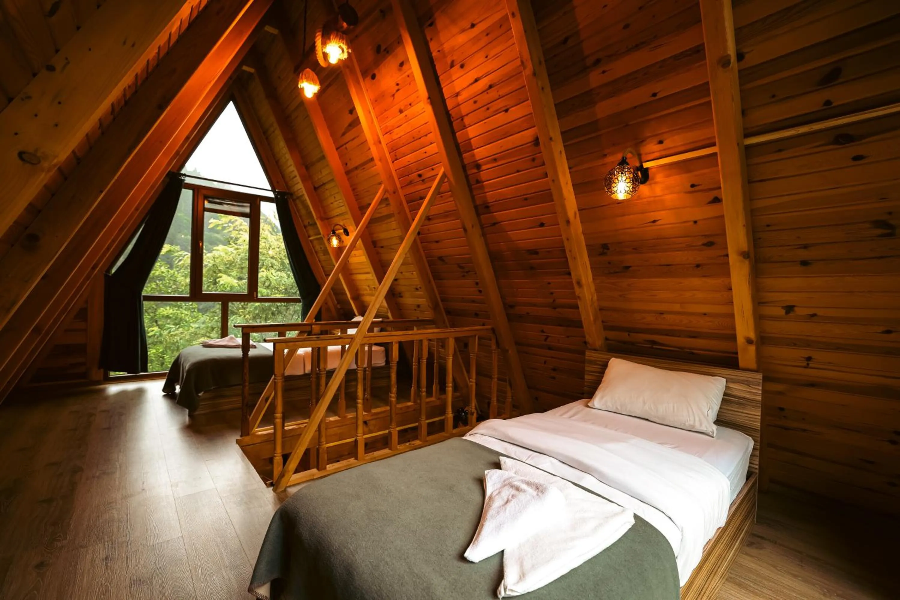 Bed in bungalove tatil köyü