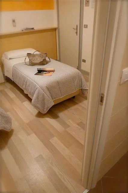 Bedroom, Bed in Hotel Mirella e Ristorante Bar Don Bacco