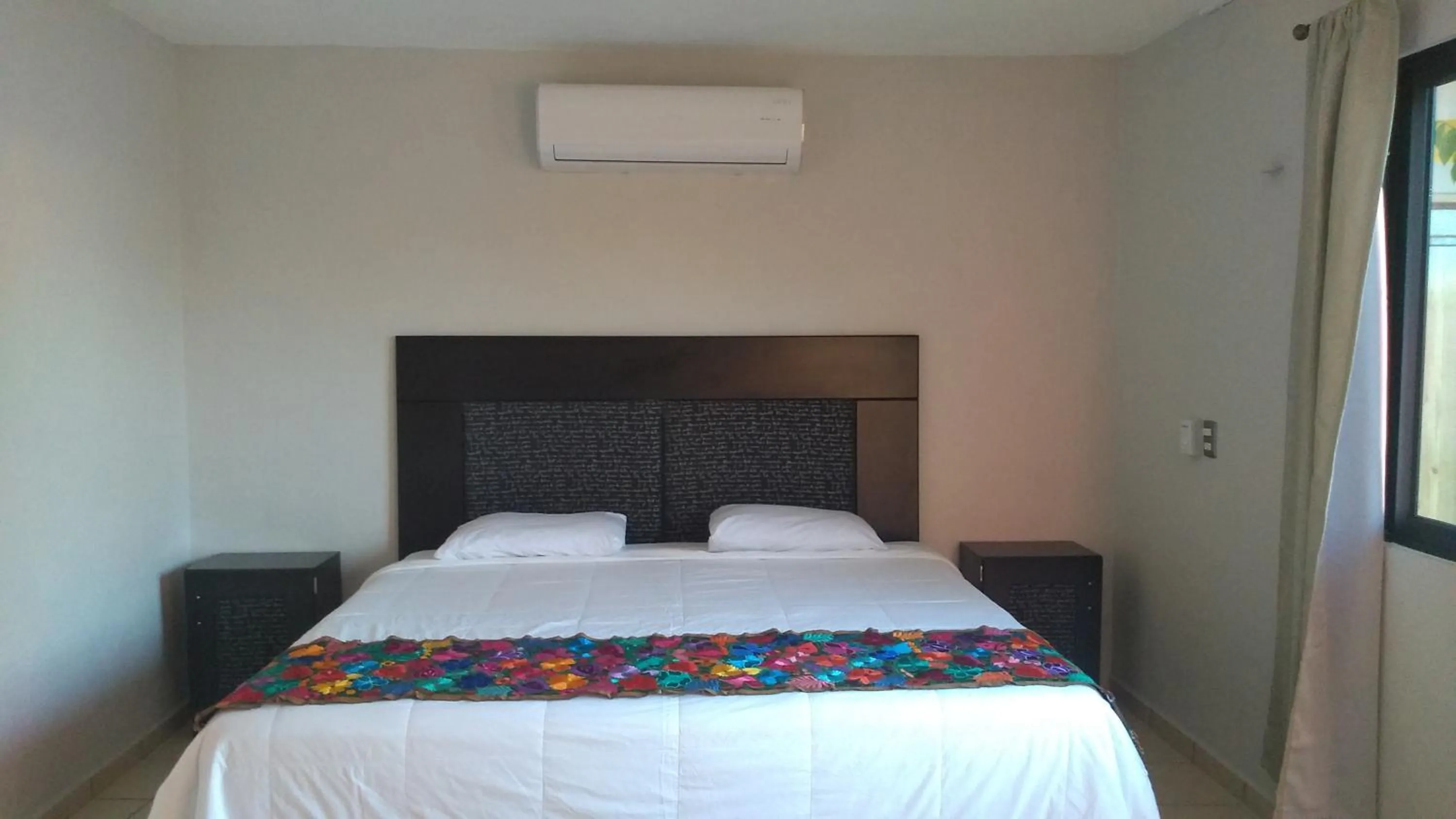 Bed in Hotel Kinich Ahau