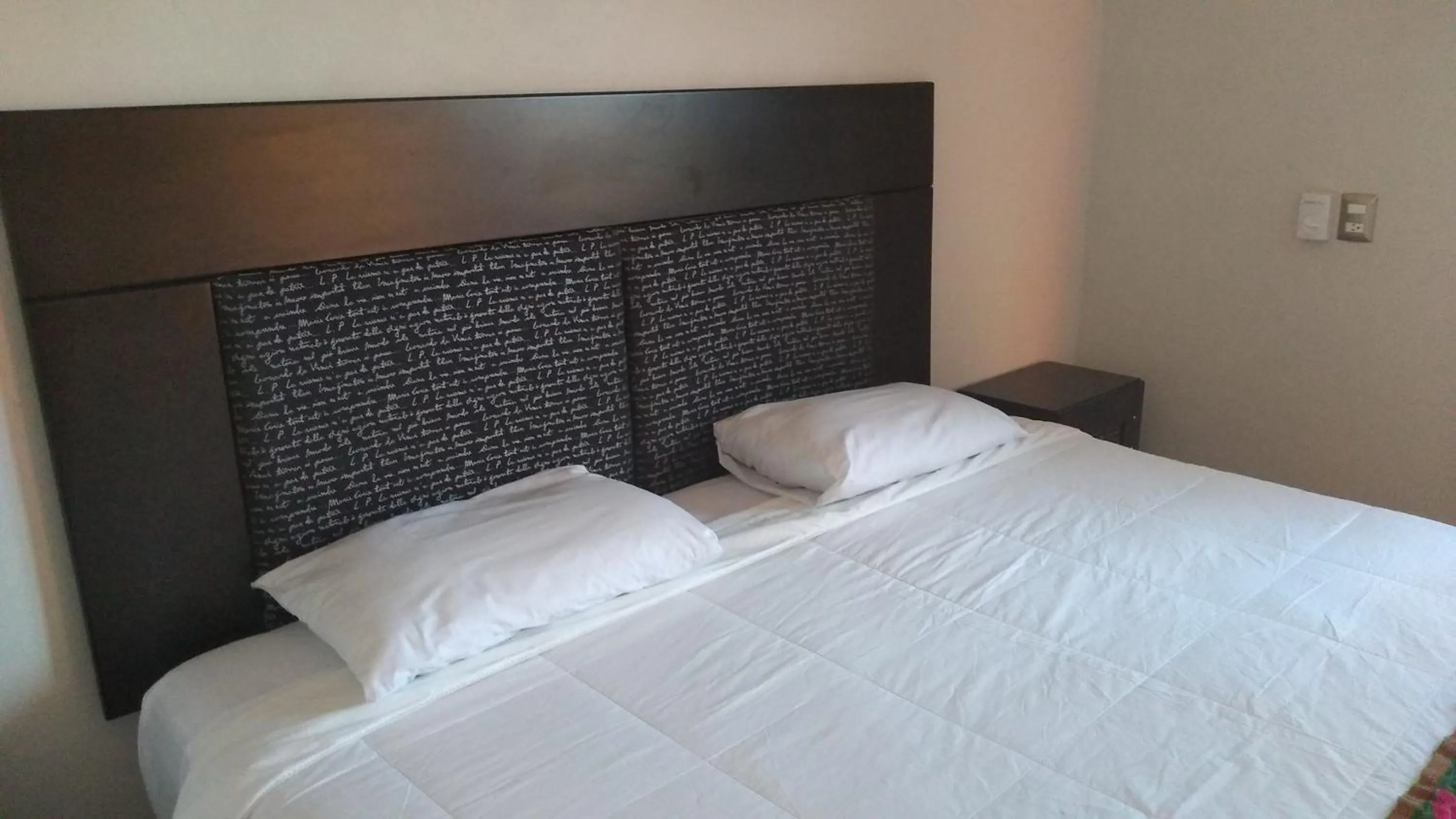 Bed in Hotel Kinich Ahau