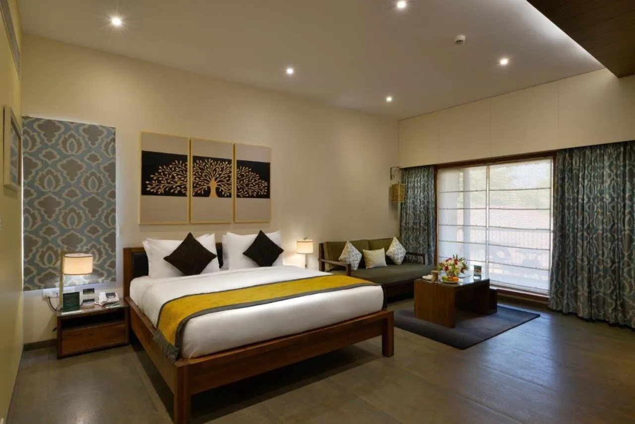 Photo of the whole room, Bed in Madhubhan Resort & Spa