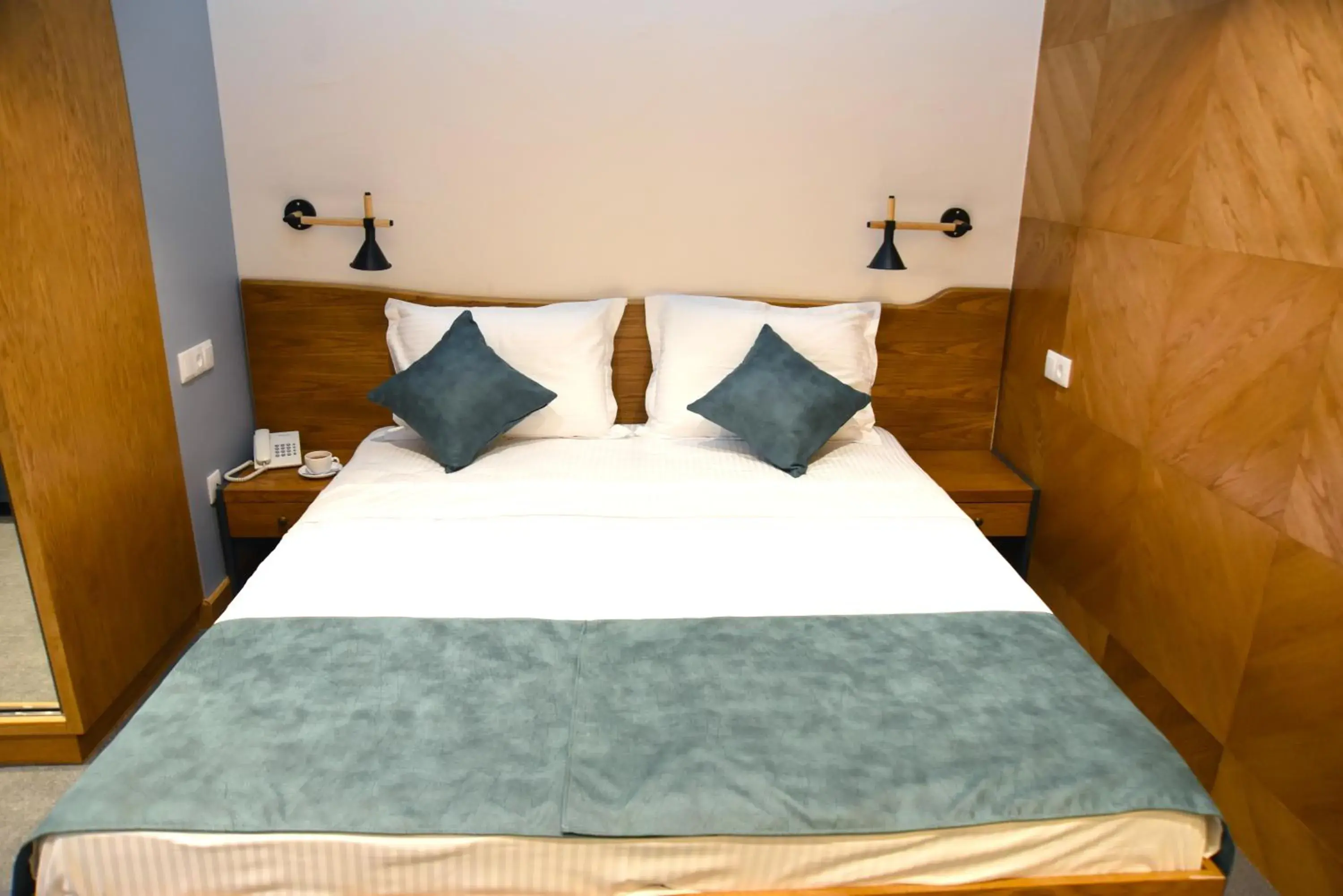 Bed in R&R Hotel Bed in R&R Hotel