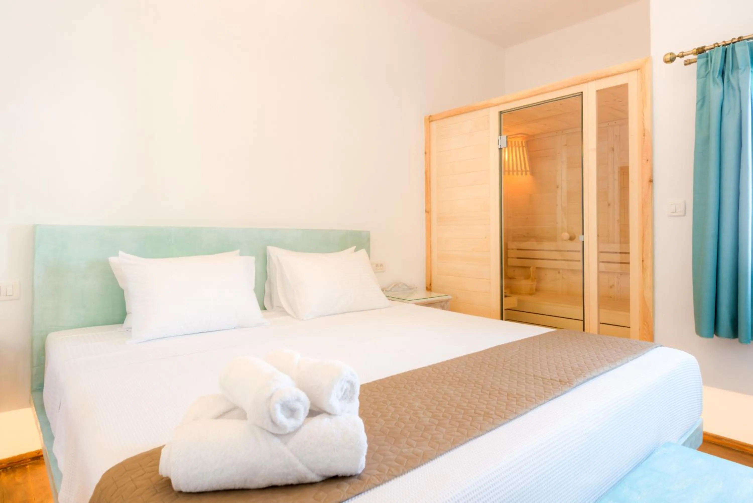 Bed in Pasithea Suites