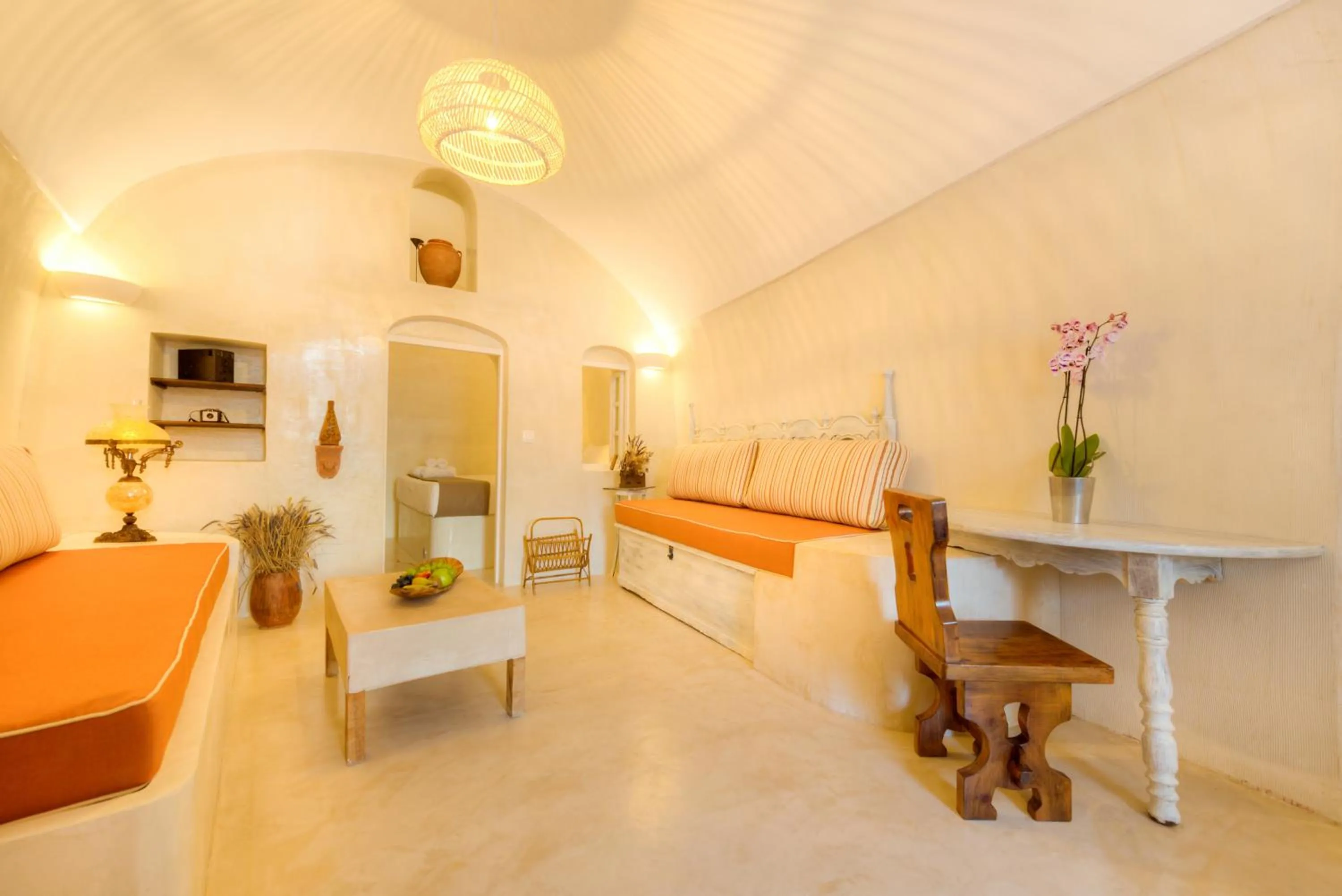 Living room, Bed in Pasithea Suites