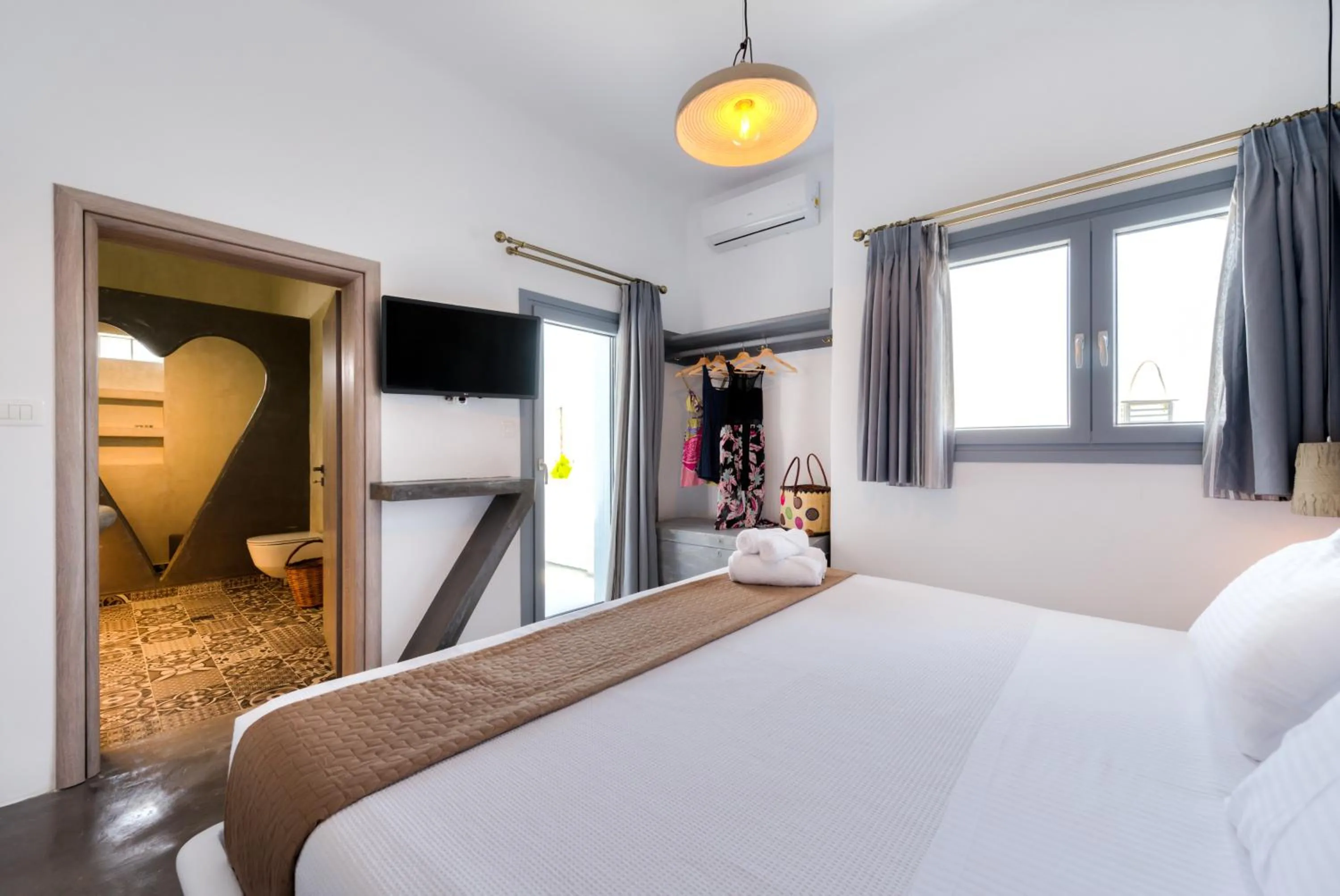Bed in Pasithea Suites