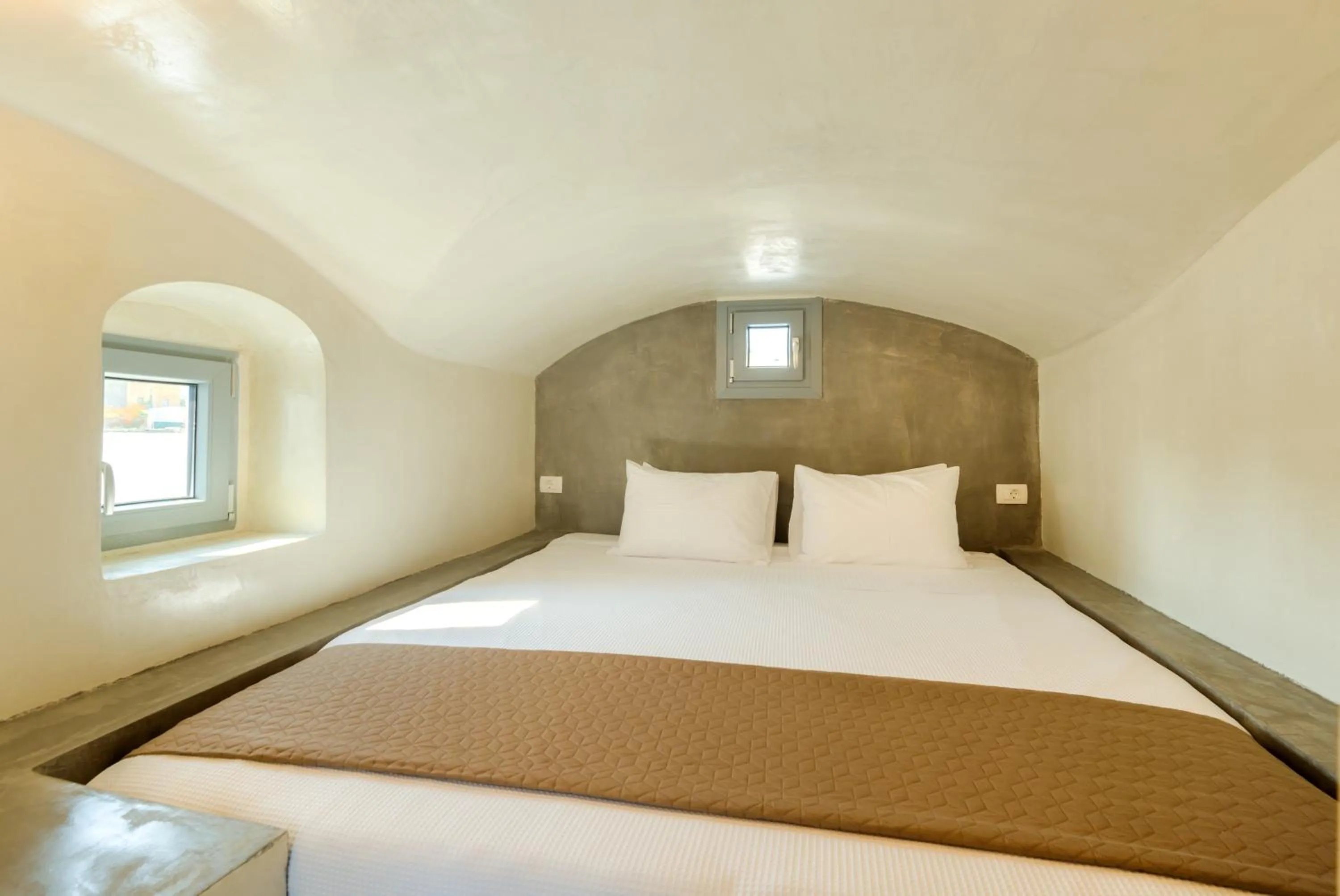 Bed in Pasithea Suites