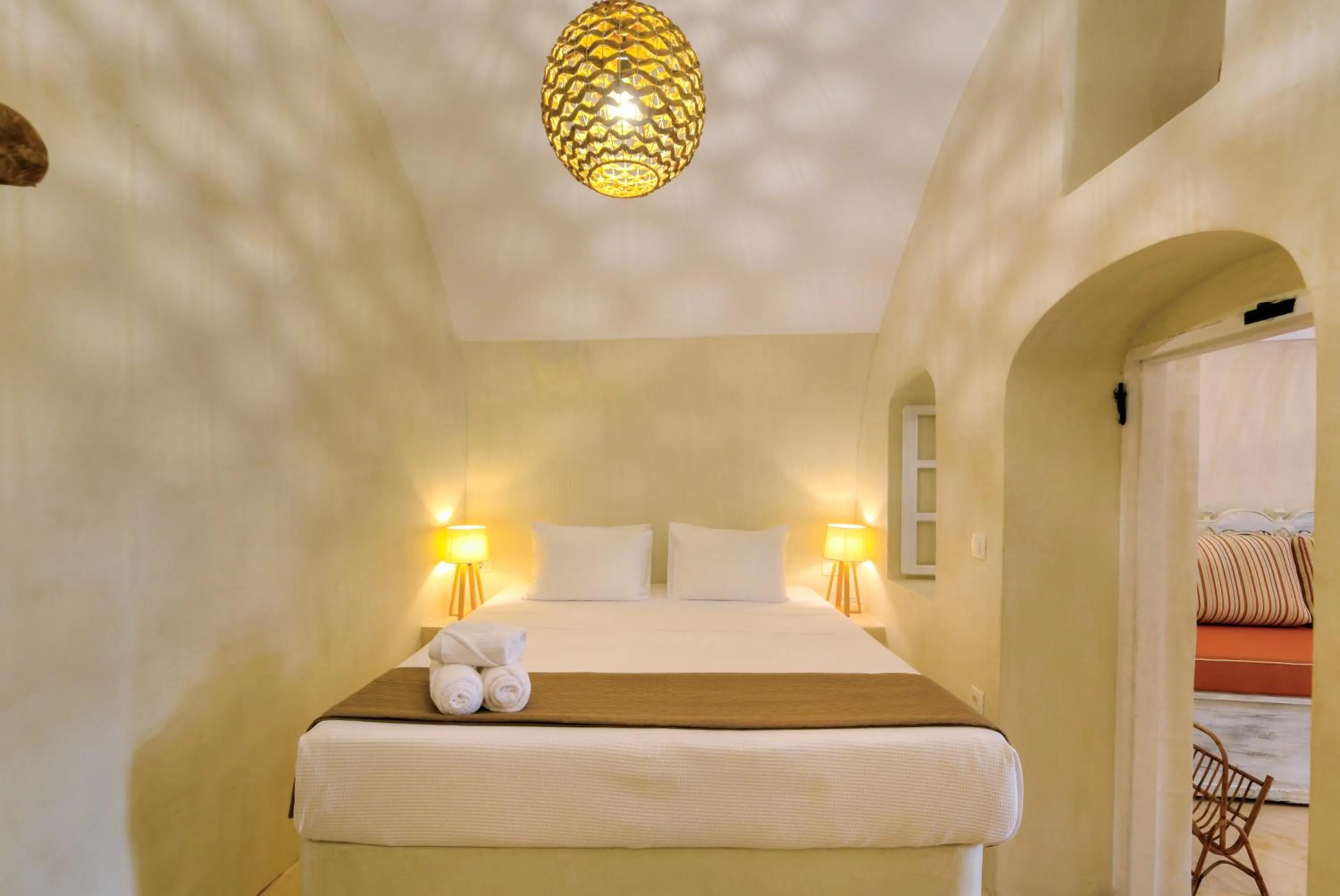 Bed in Pasithea Suites