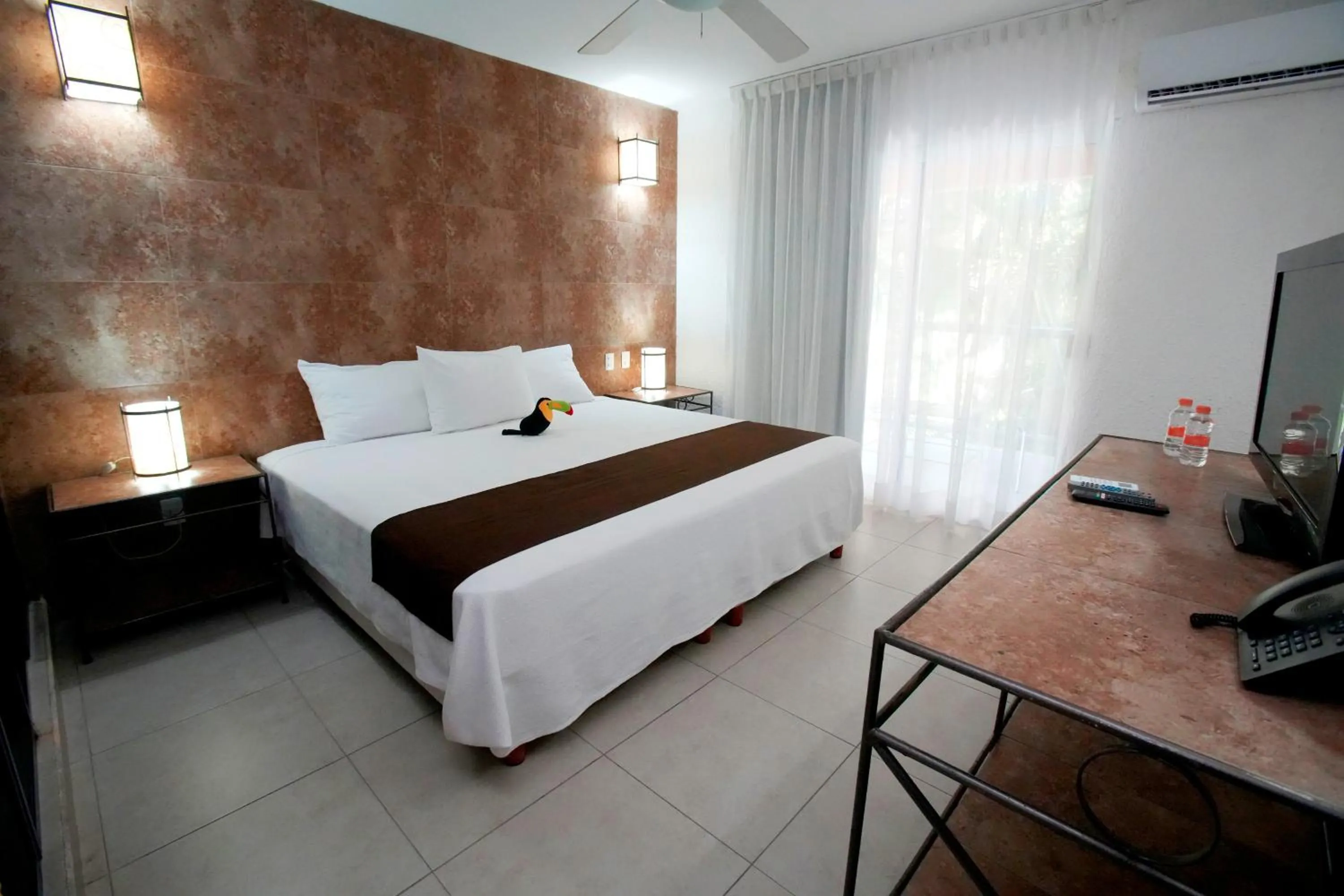 Bed in Tukan Hotel Playa del Carmen