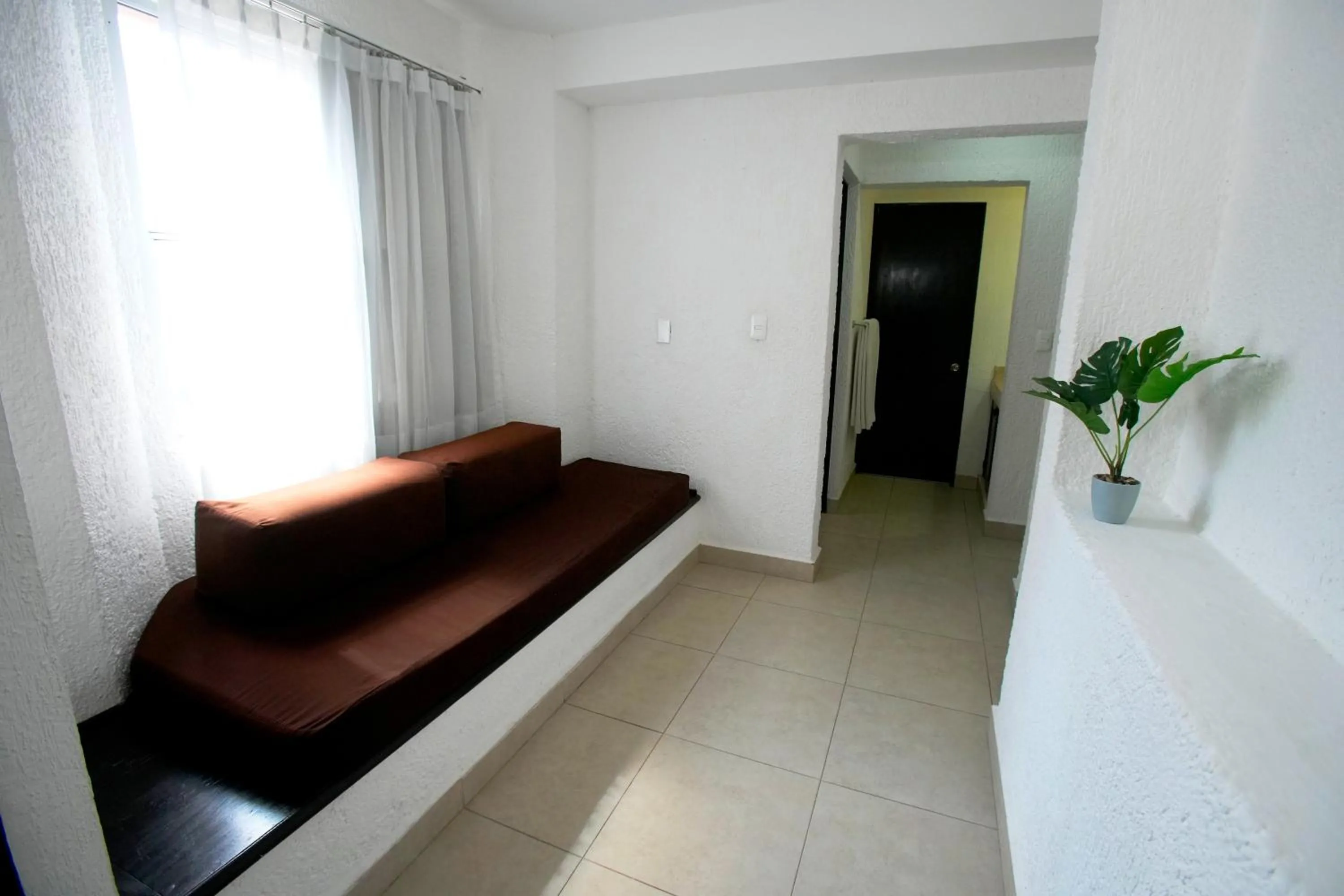 Living room in Tukan Hotel Playa del Carmen