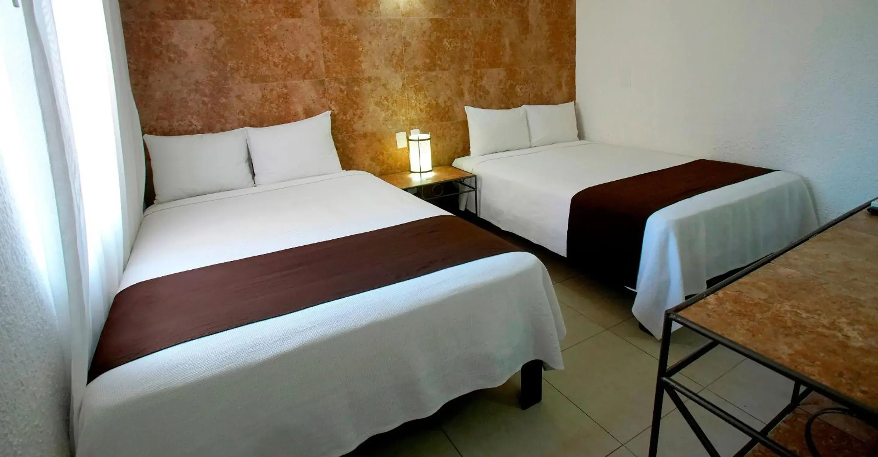 Bed in Tukan Hotel Playa del Carmen Bed in Tukan Hotel Playa del Carmen