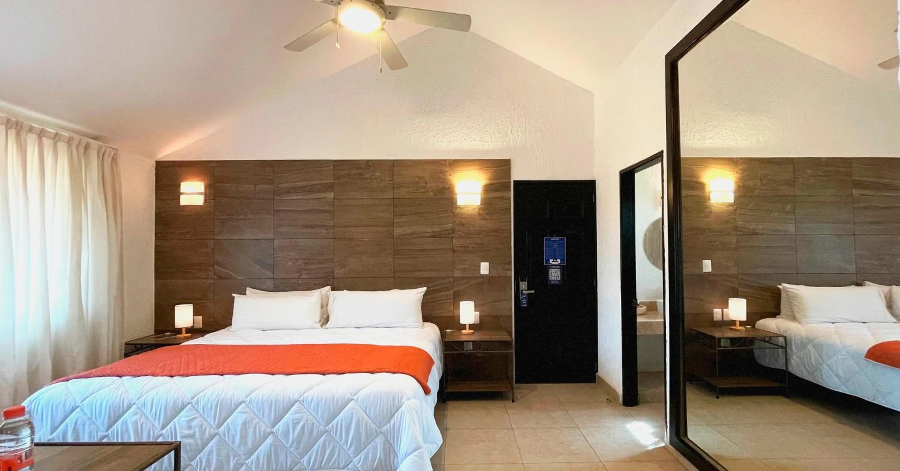 Bed in Tukan Hotel Playa del Carmen