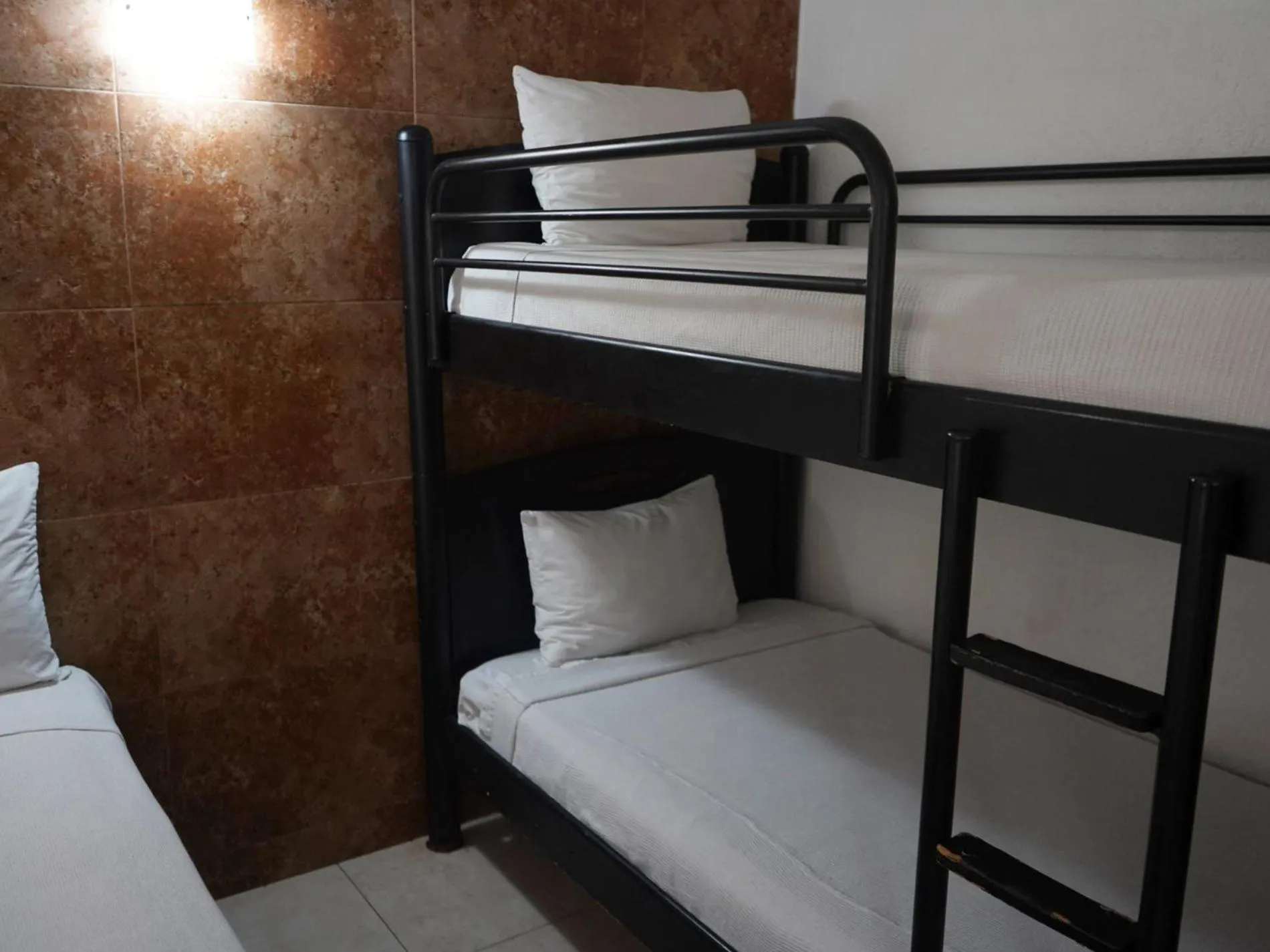 Bed in Tukan Hotel Playa del Carmen