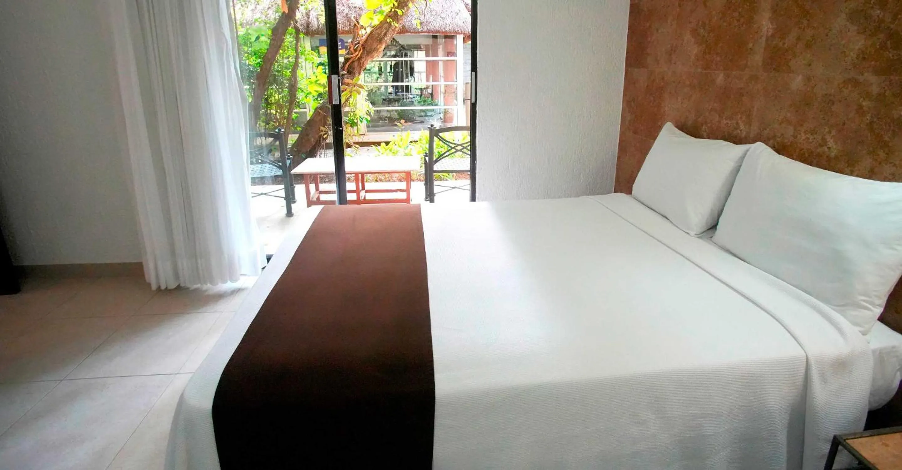 Bed in Tukan Hotel Playa del Carmen