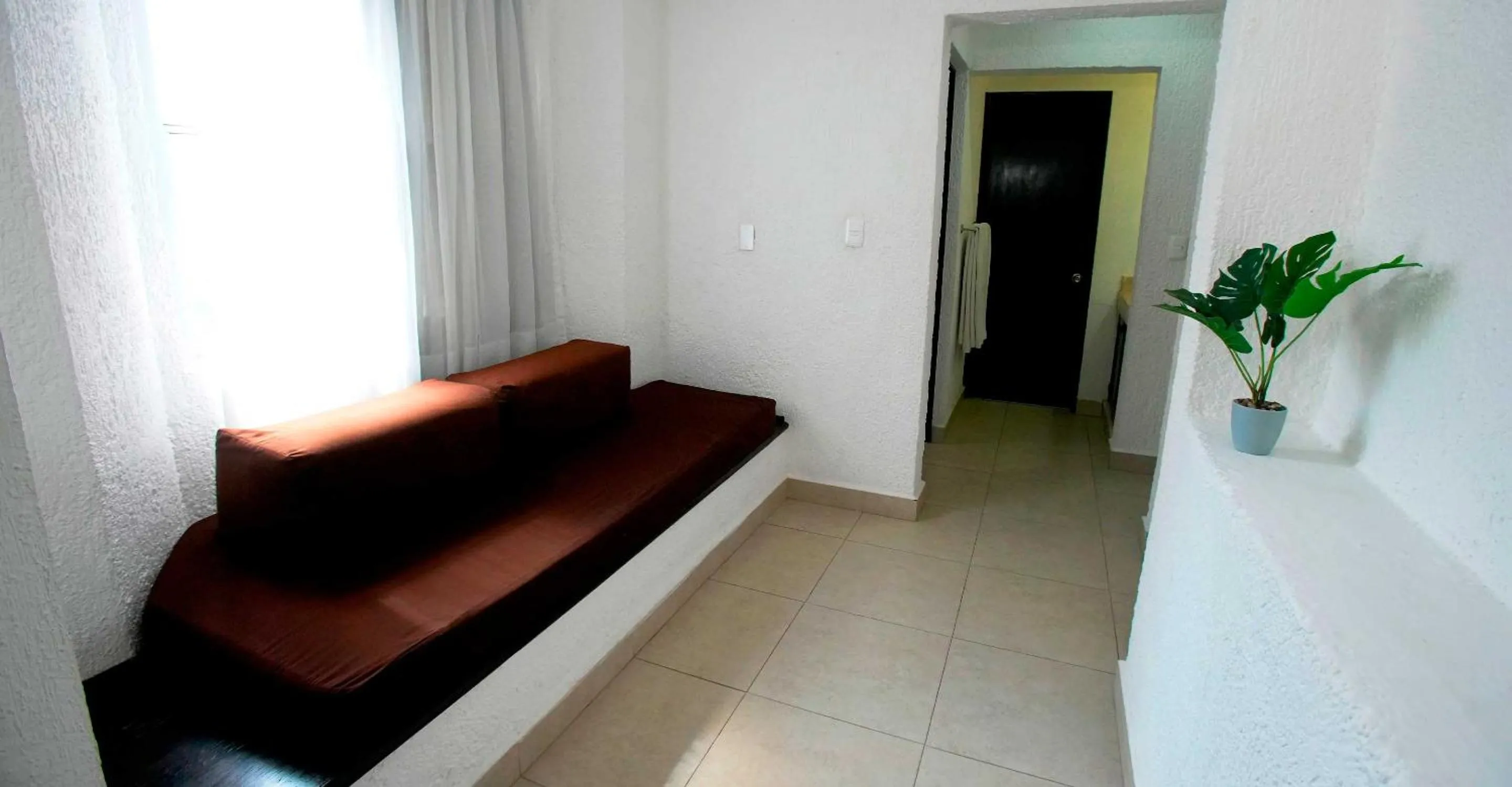 Living room in Tukan Hotel Playa del Carmen