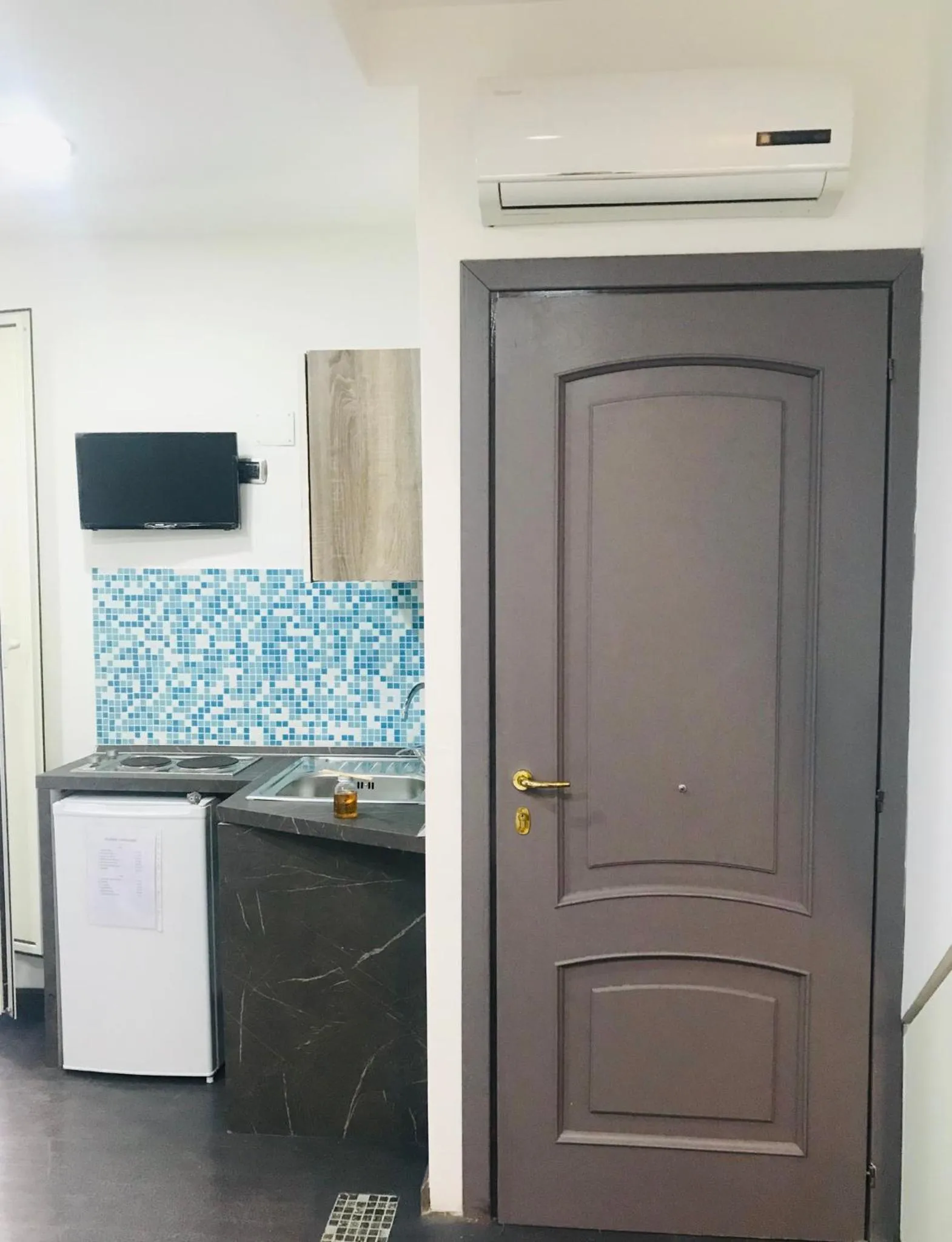 Kitchen or kitchenette in Vacanze Partenopee