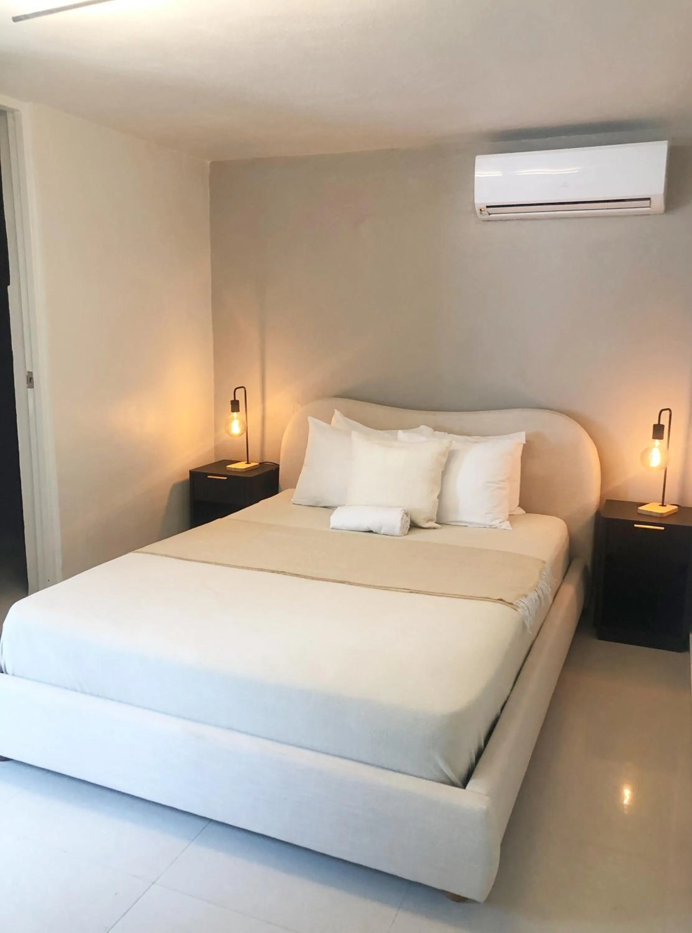 Bed in Aura House Isla Verde