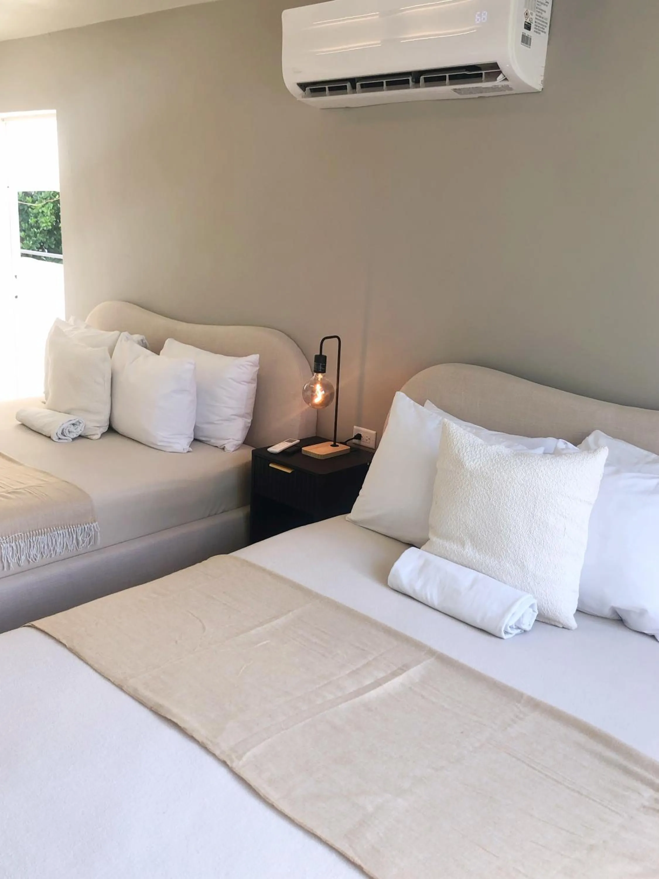 Bed in Aura House Isla Verde