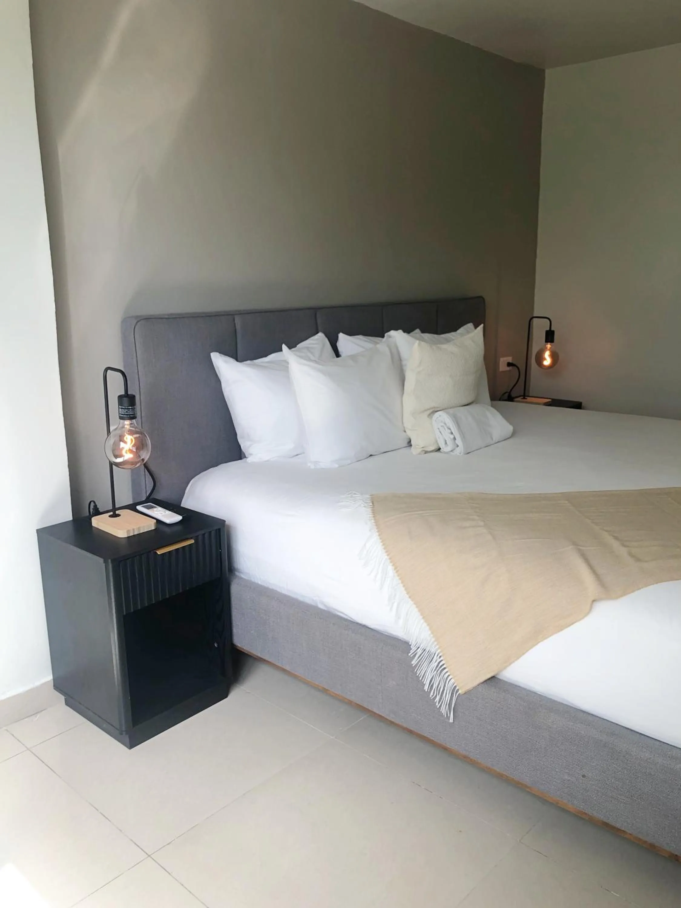 Bed in Aura House Isla Verde