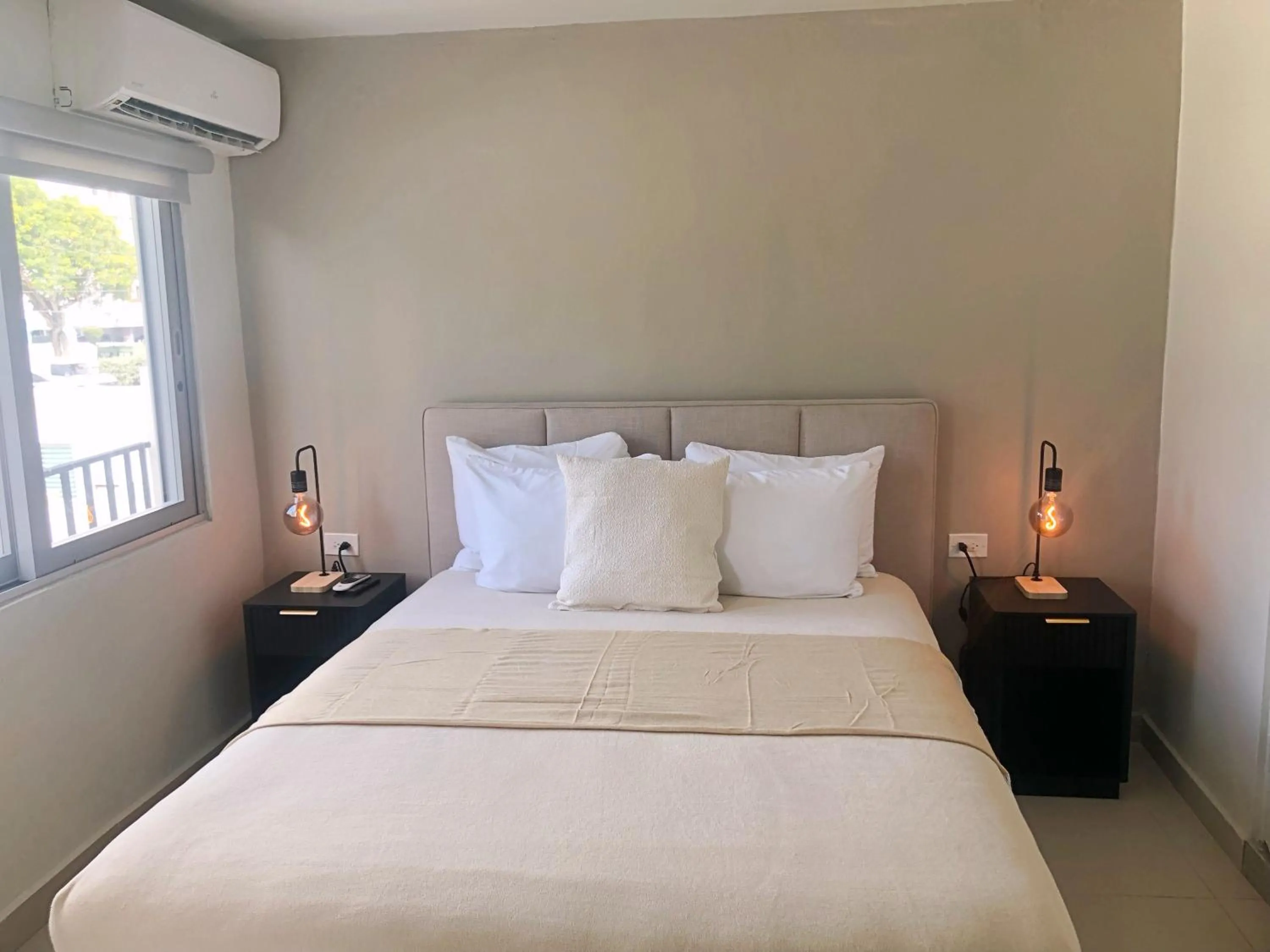 Bed in Aura House Isla Verde