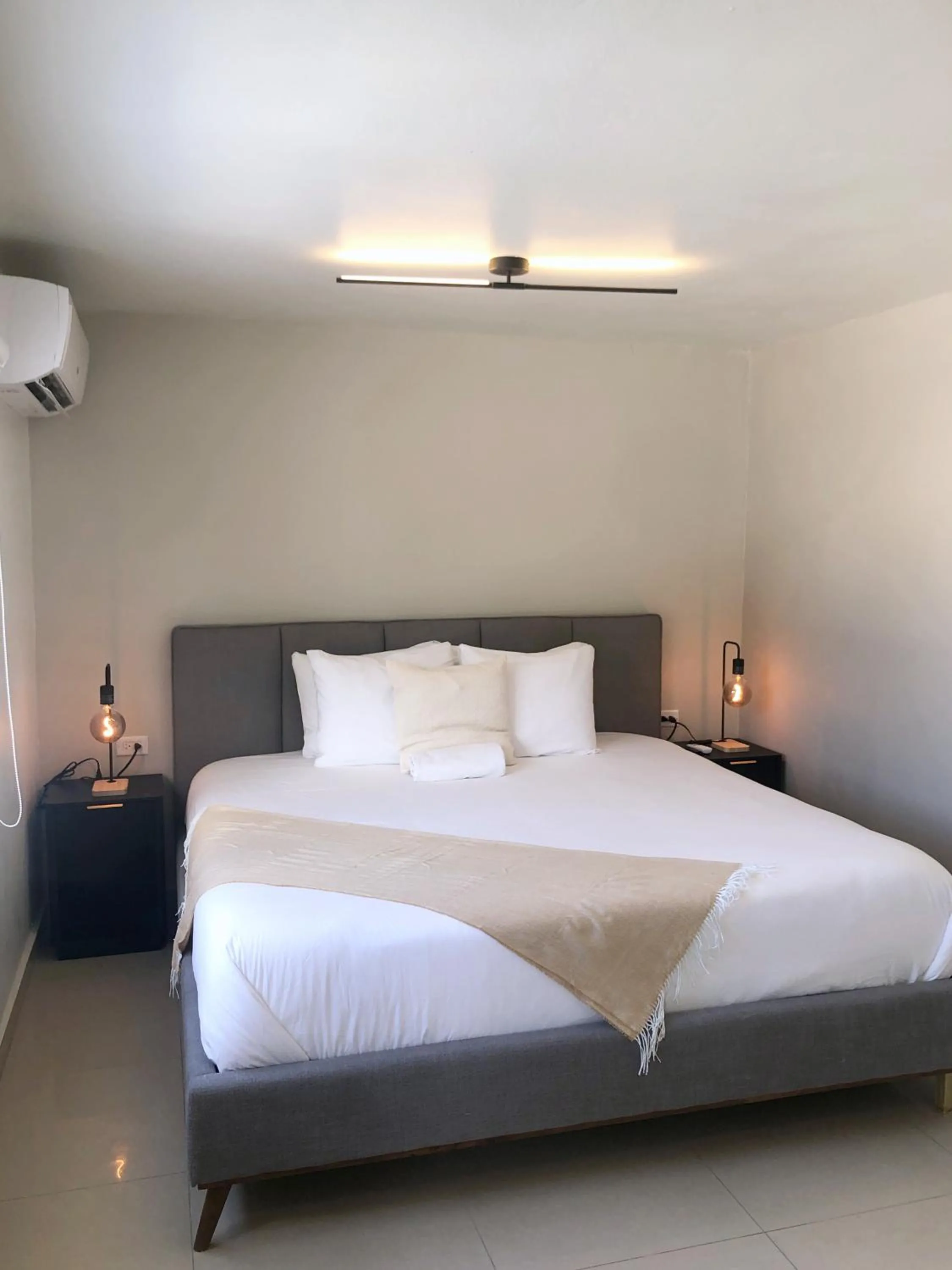 Bed in Aura House Isla Verde