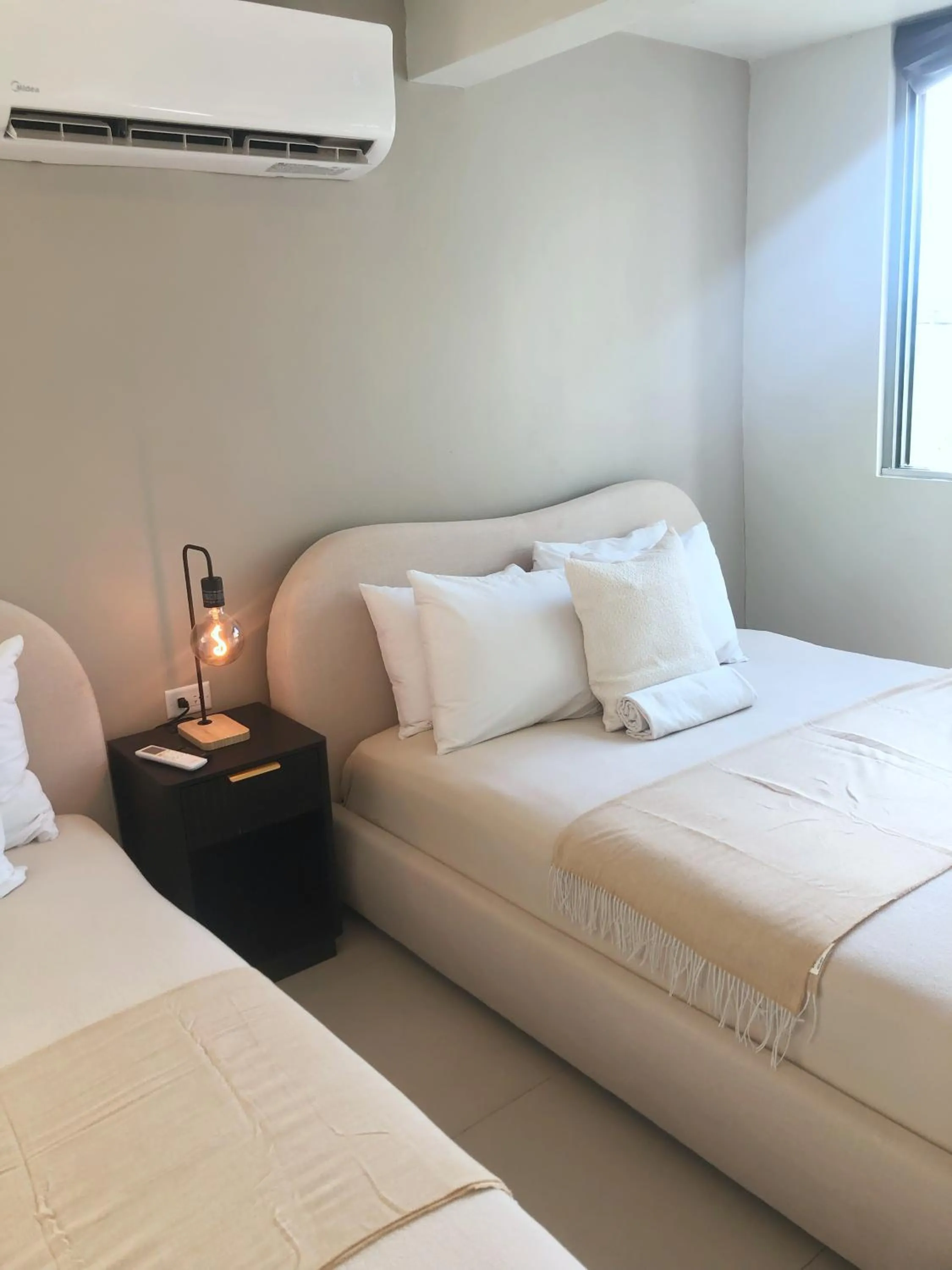 Bed in Aura House Isla Verde