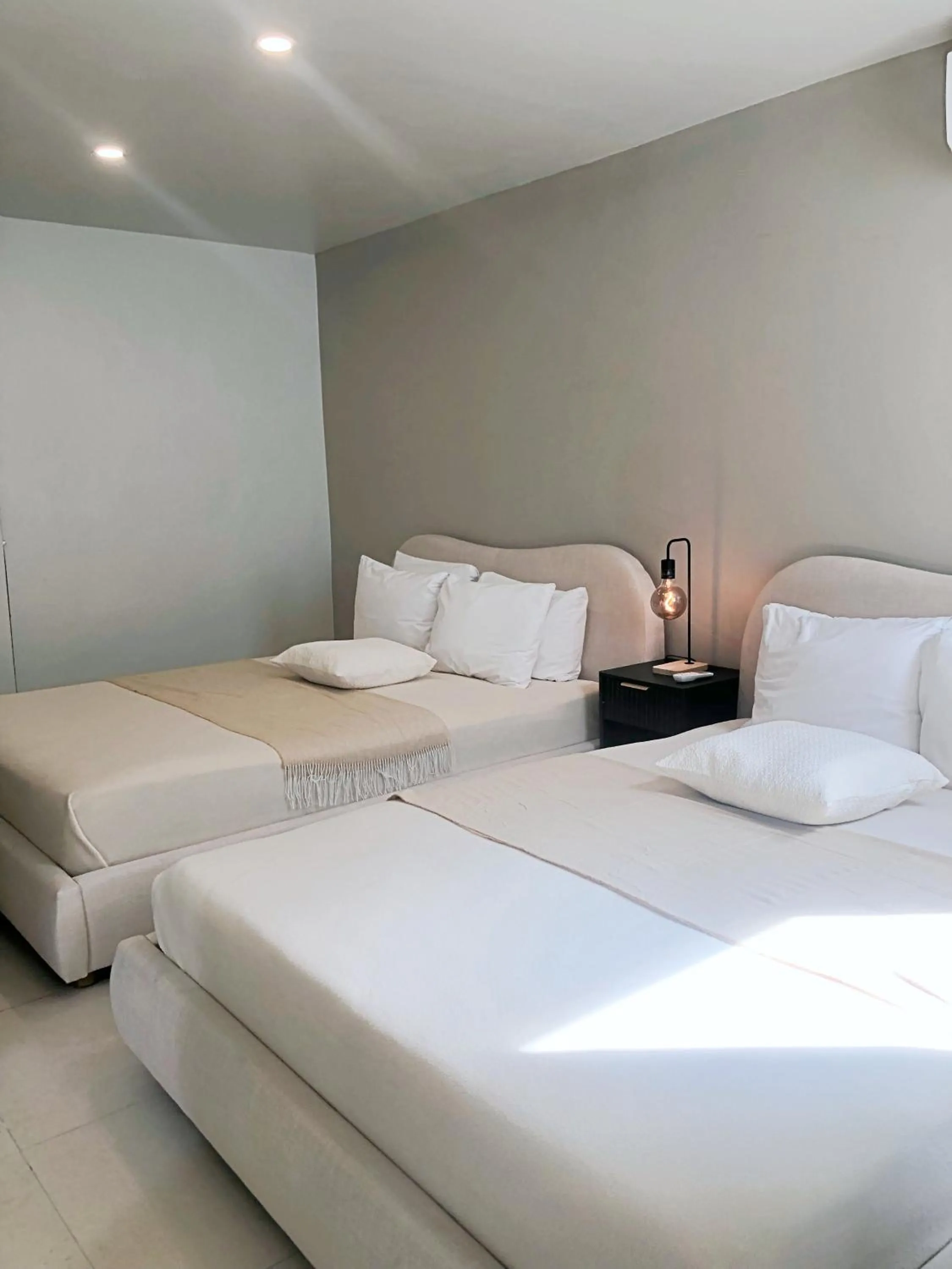 Bed in Aura House Isla Verde