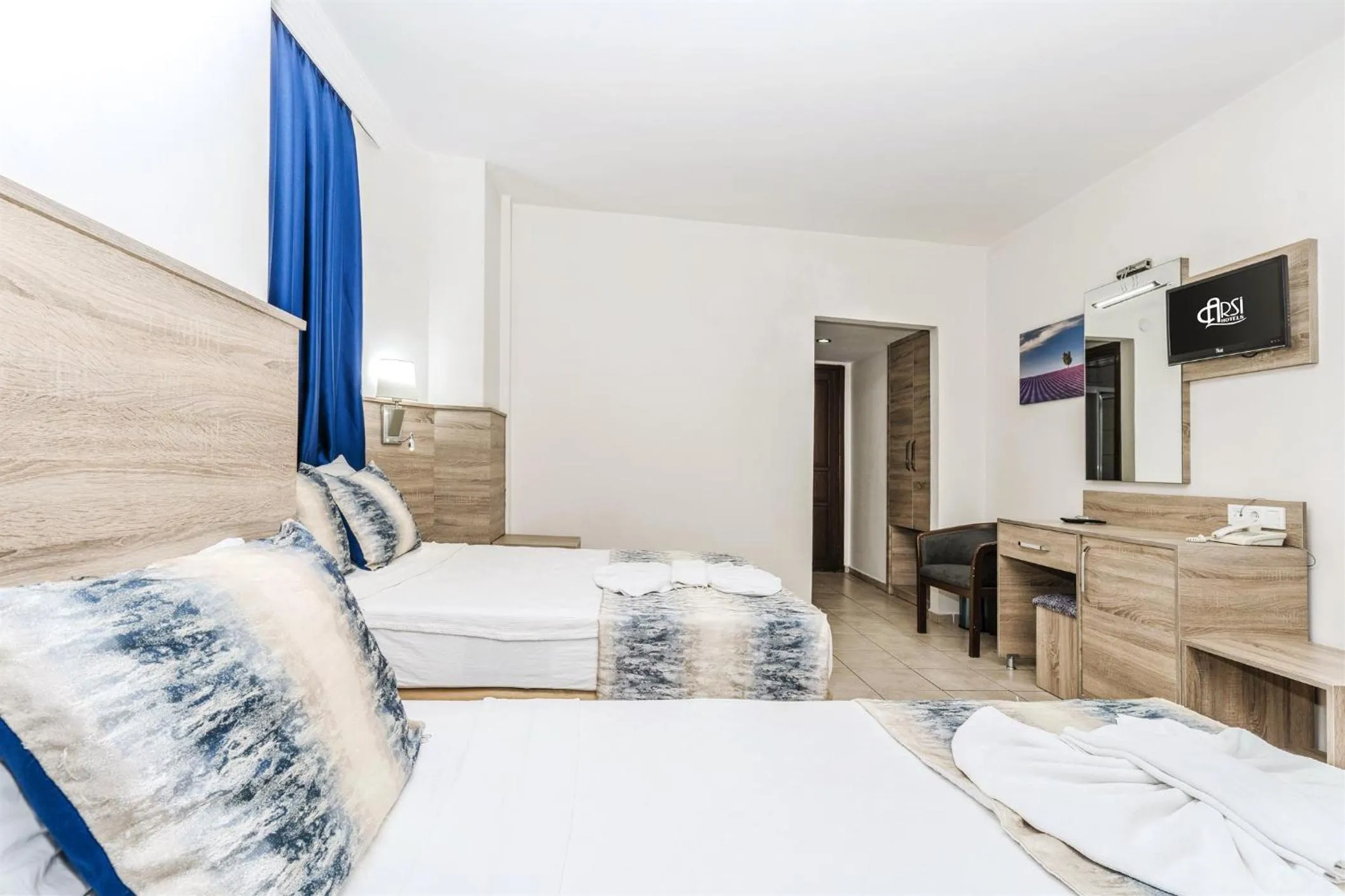 Bed in Kleopatra Arsi Hotel