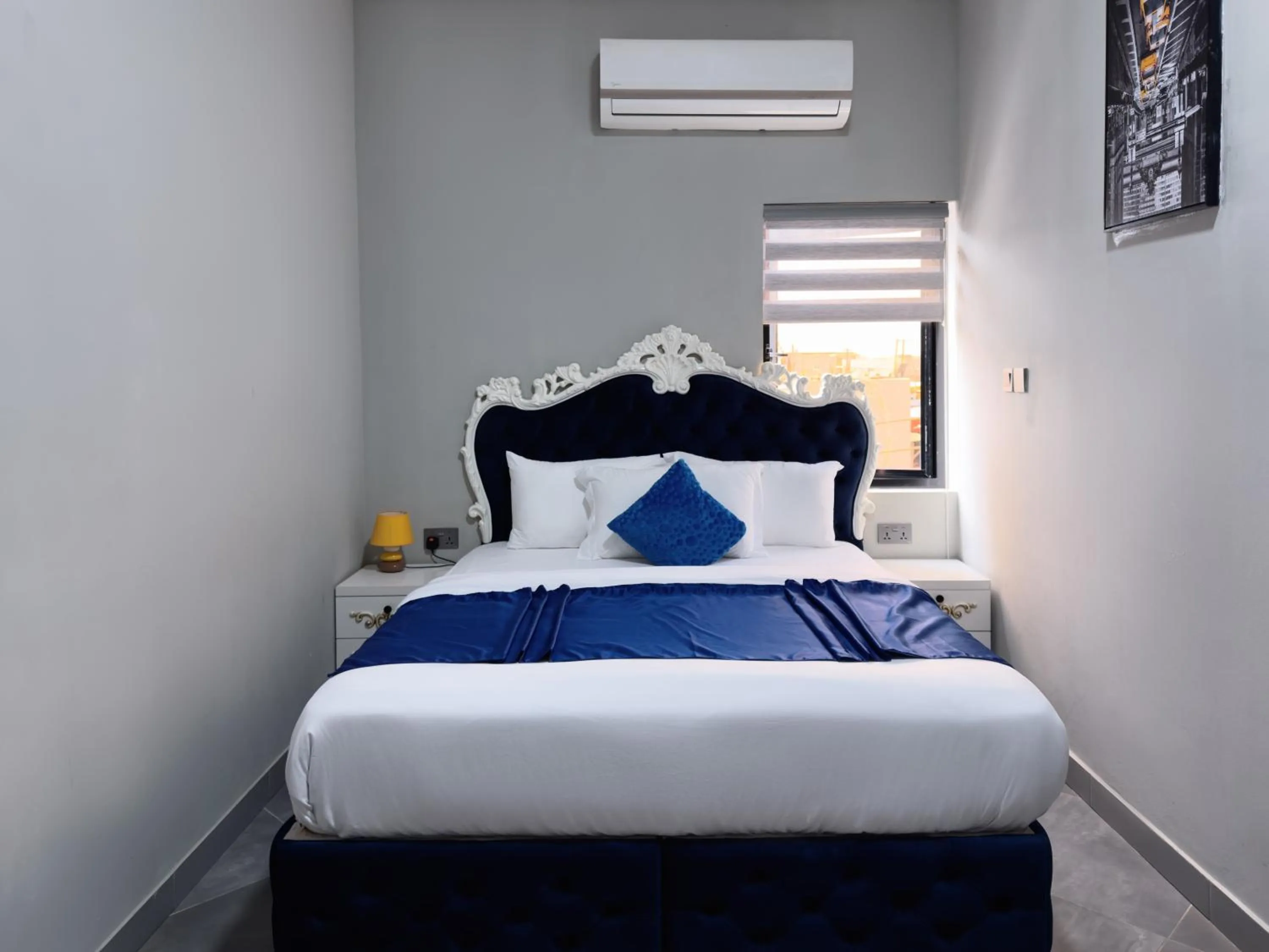 Bed in Euro Homes Hotel