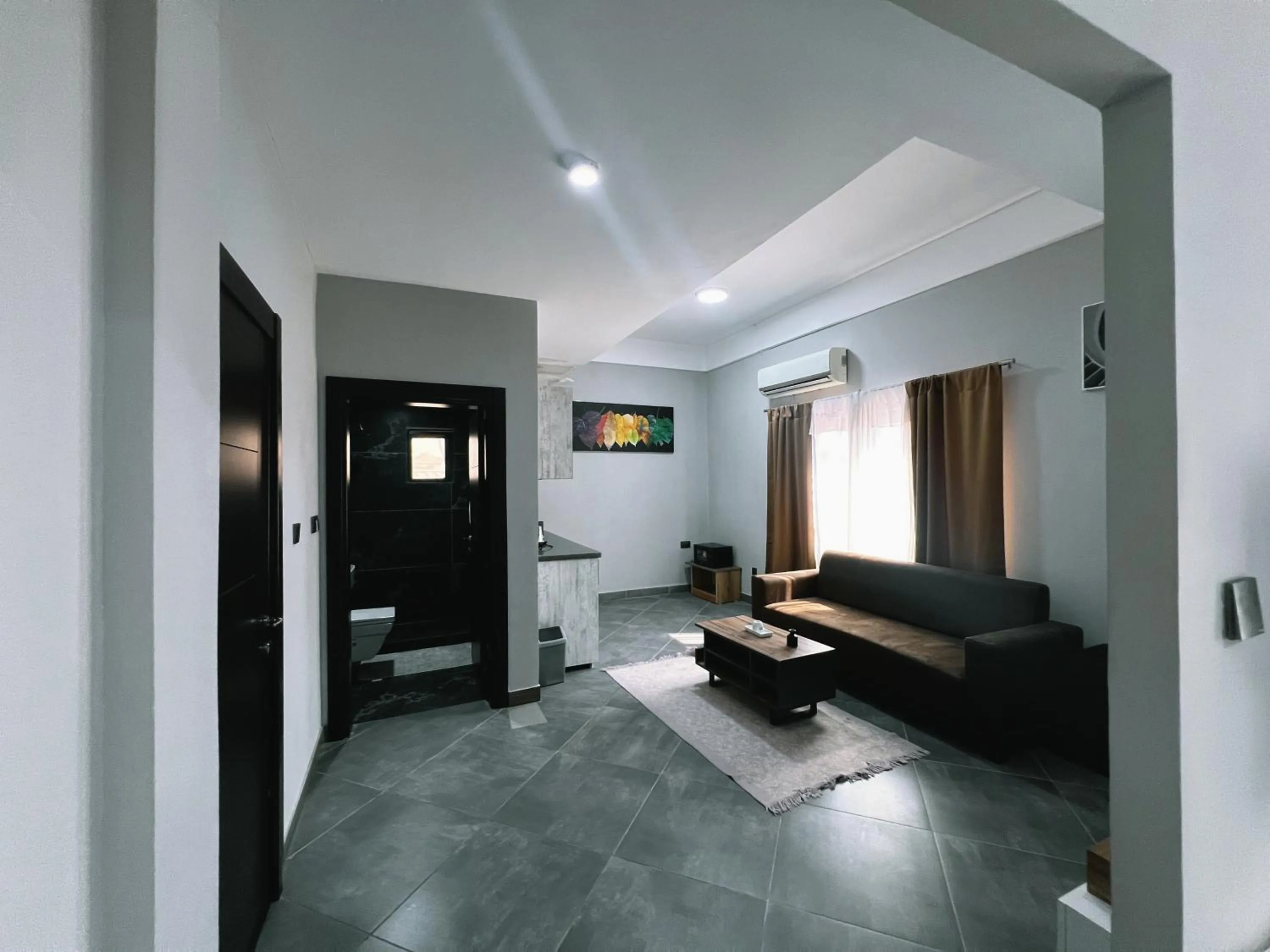 Bed in Euro Homes Hotel