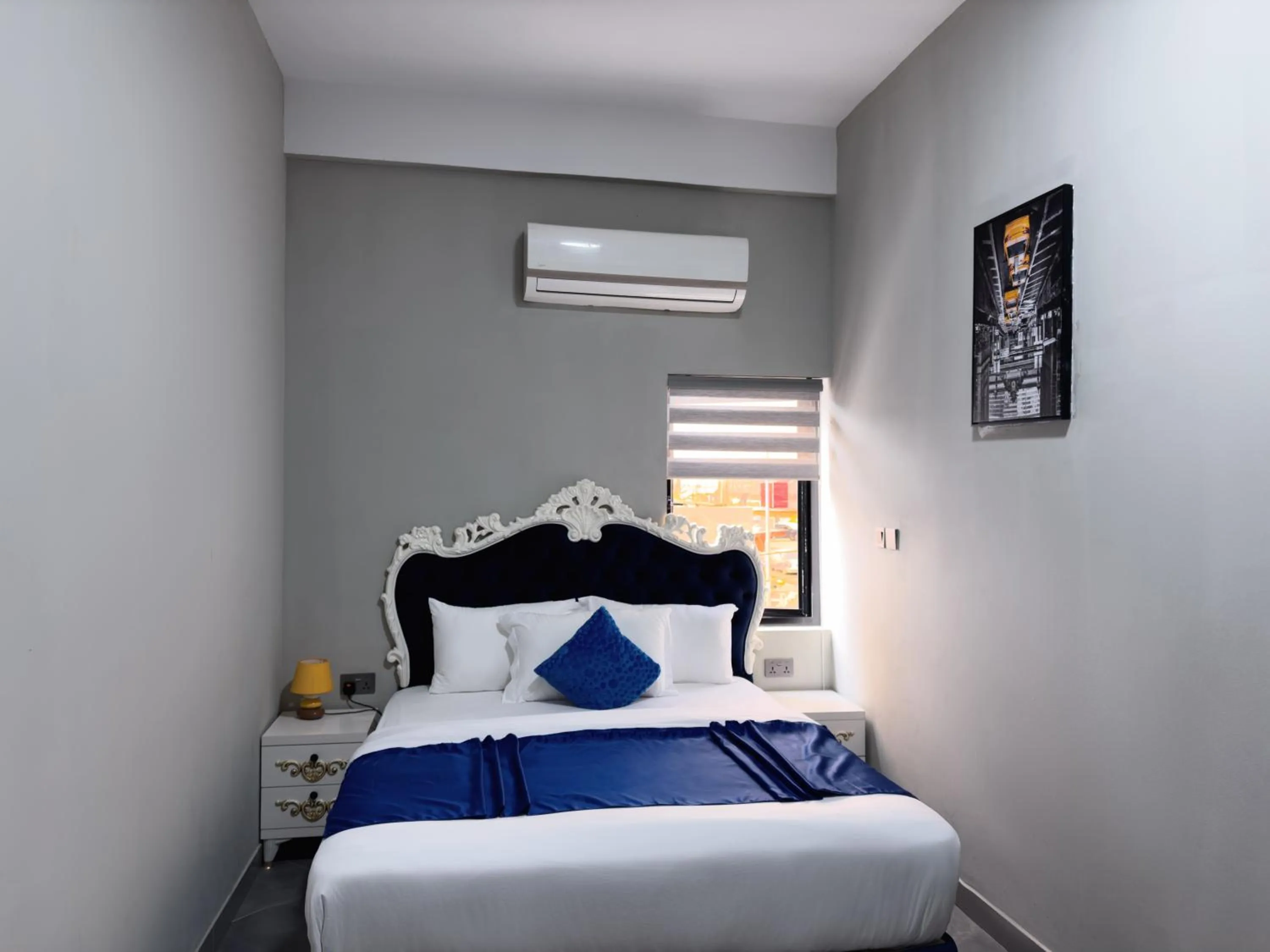 Bed in Euro Homes Hotel