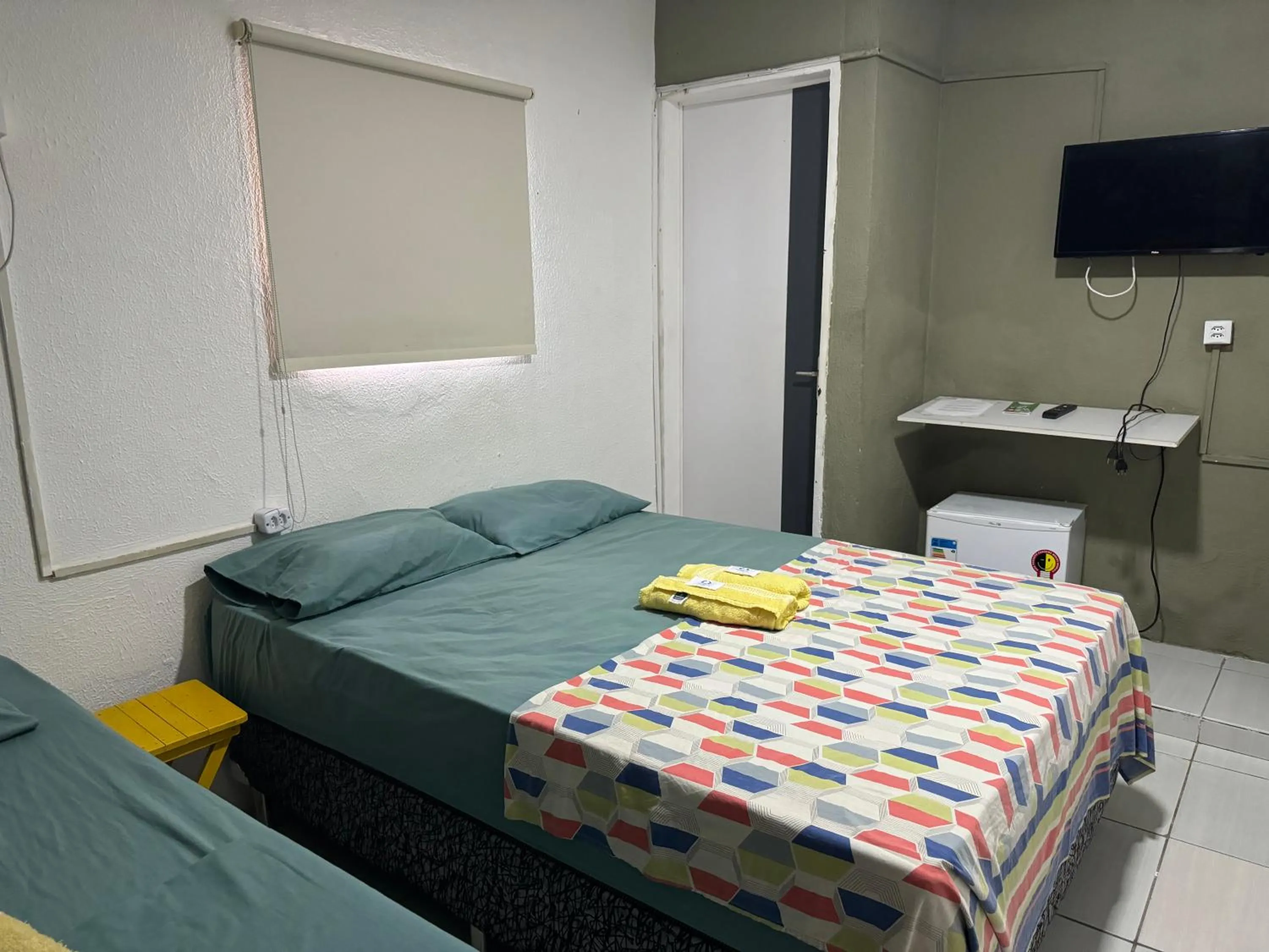 Bed in Casa da Esquina Pousada