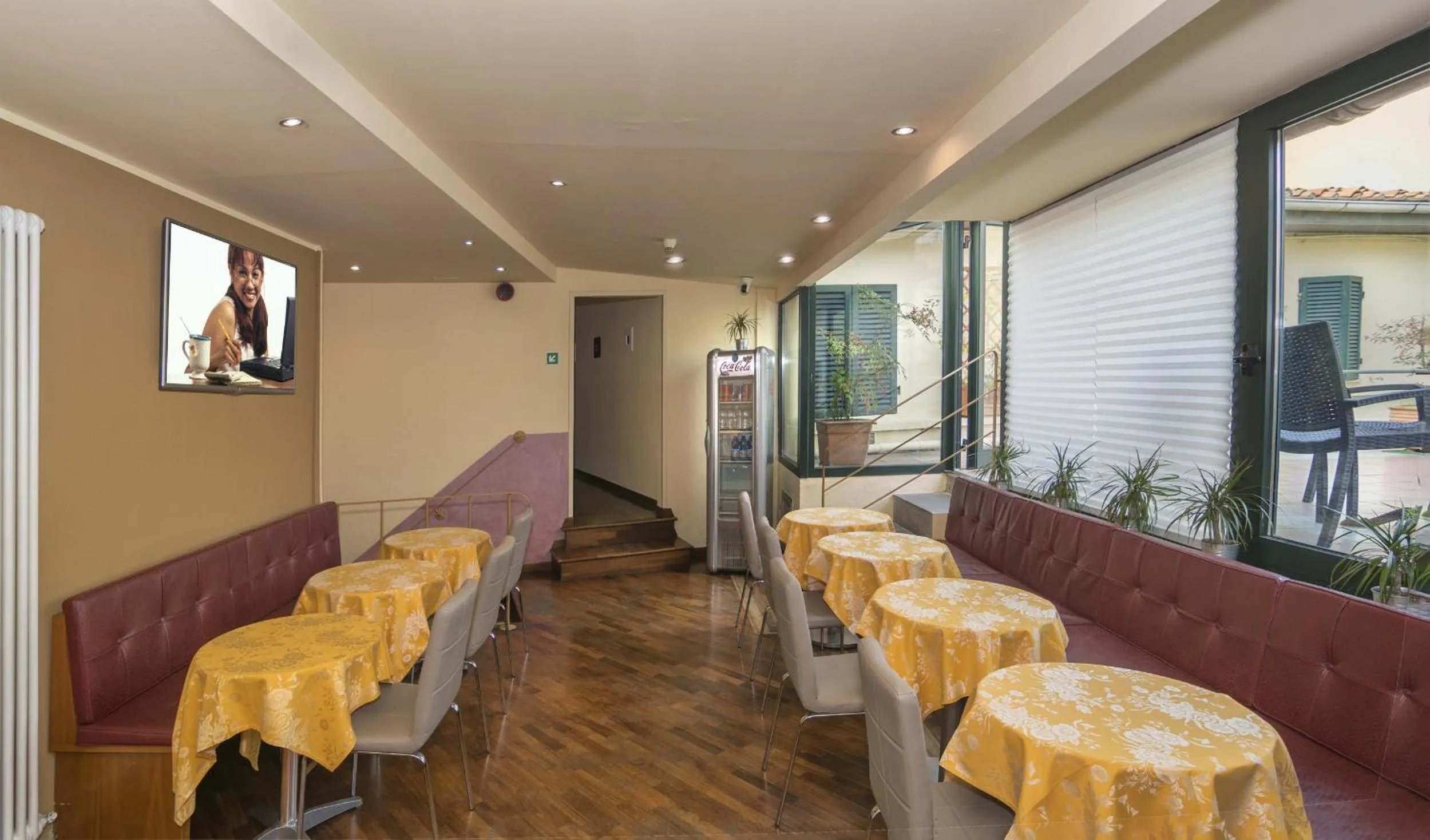 Communal lounge/ TV room in Hotel Il Giardino